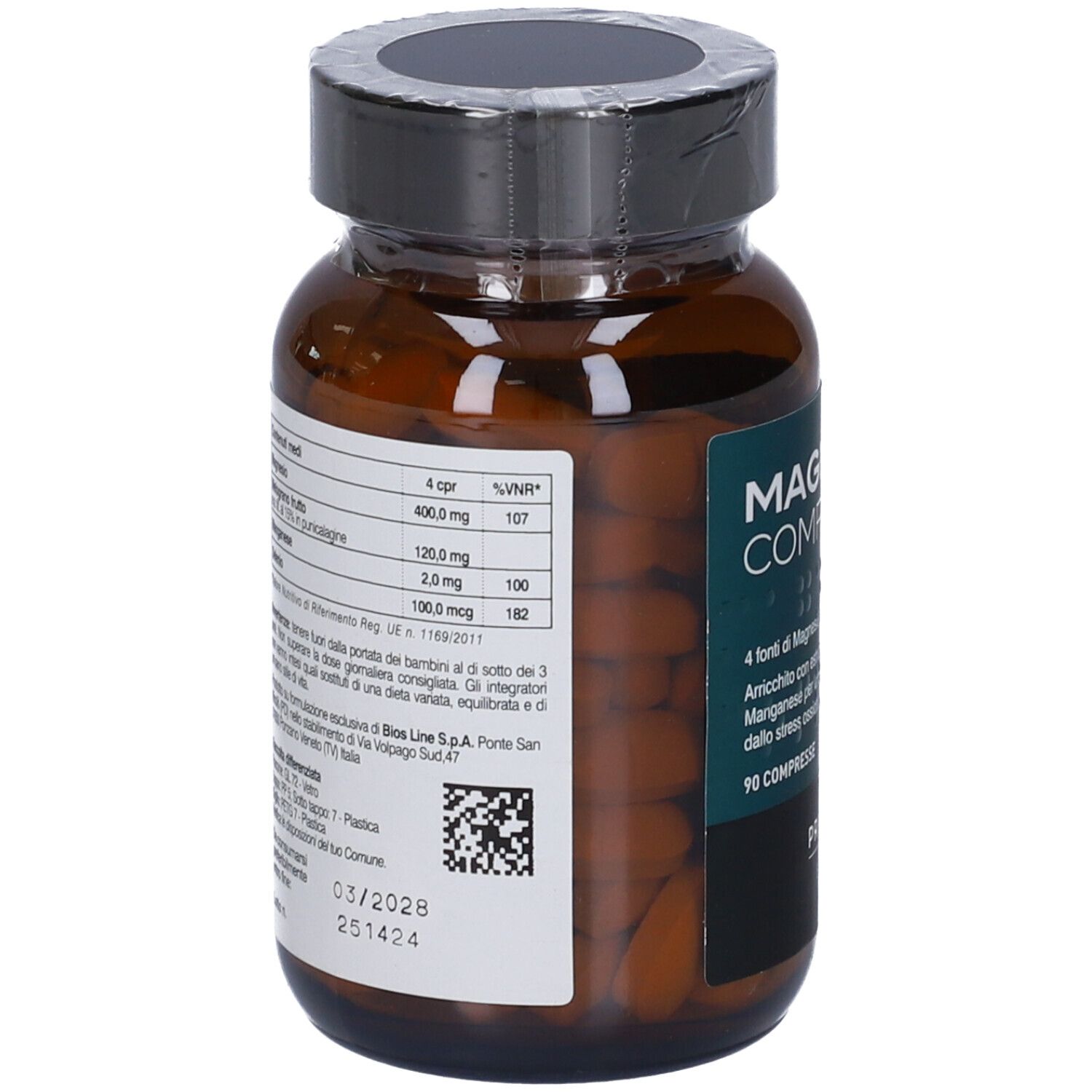 Retro del flacone di vetro marrone. Etichetta con informazioni nutrizionali e codice QR. Testo: MAGNESIO COMPLETO 50+. Scadenza: 03/2026.