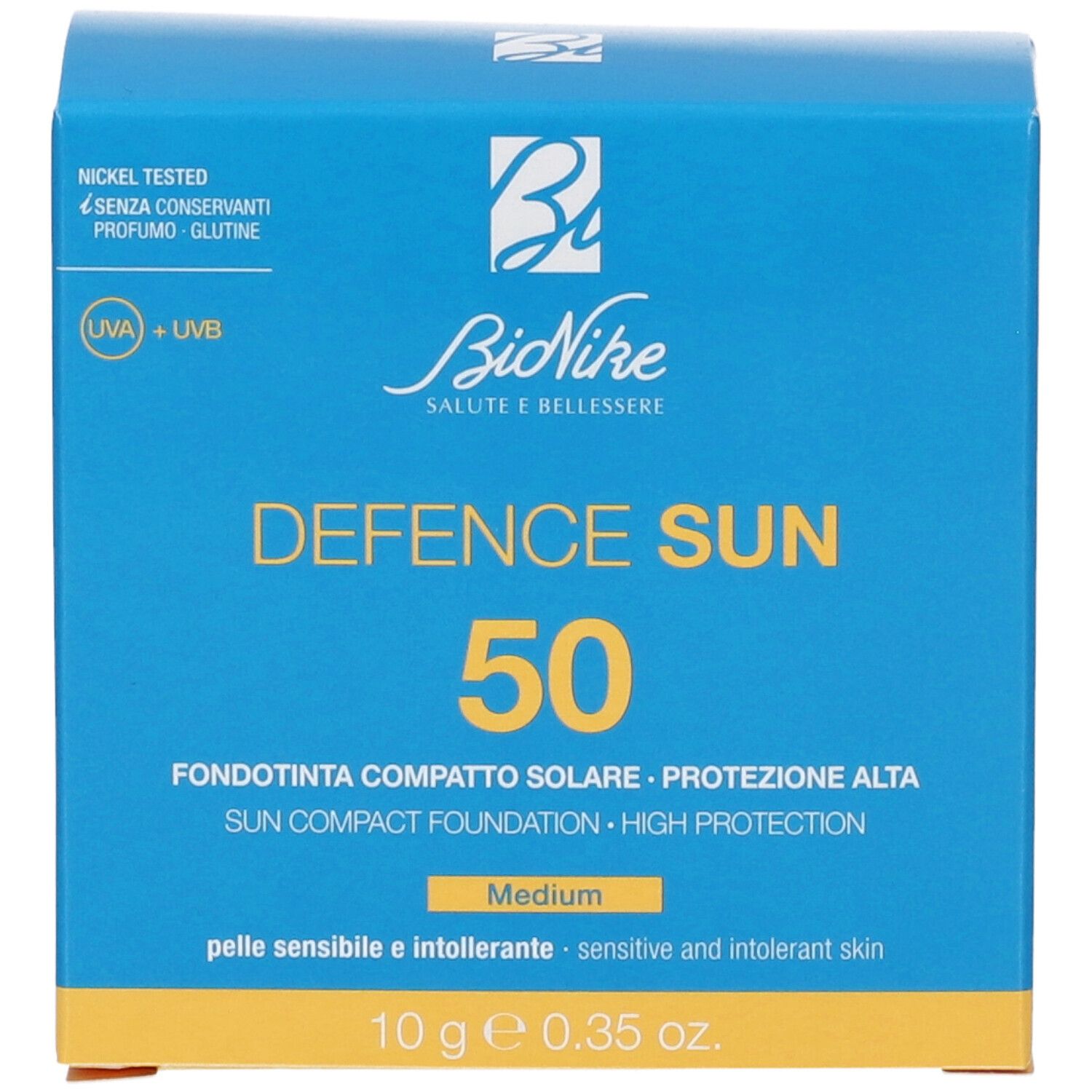 Scatola blu Bionike con 'DEFENCE SUN 50'. Contiene fondotinta compatto solare, alta protezione, tonalità Medium. 10g.