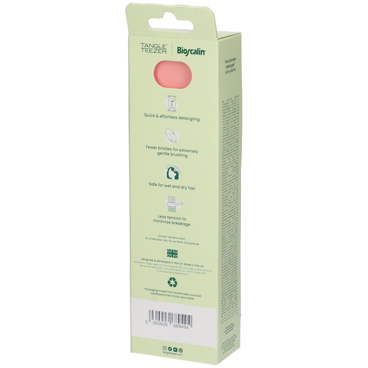 Retro della confezione della spazzola Tangle Teezer. Testo e icone. Spazzola rosa visibile. Testo: The Ultimate Detangler Extra Gentle.