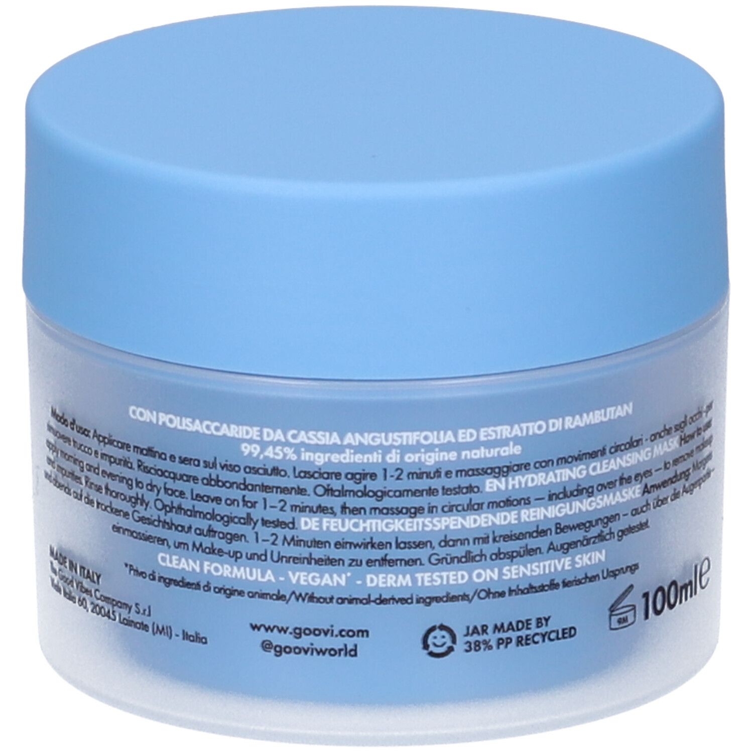 Barattolo blu chiaro. Testo multilingue. Scritta: 99,45% ingredienti di origine naturale. Vegan.
