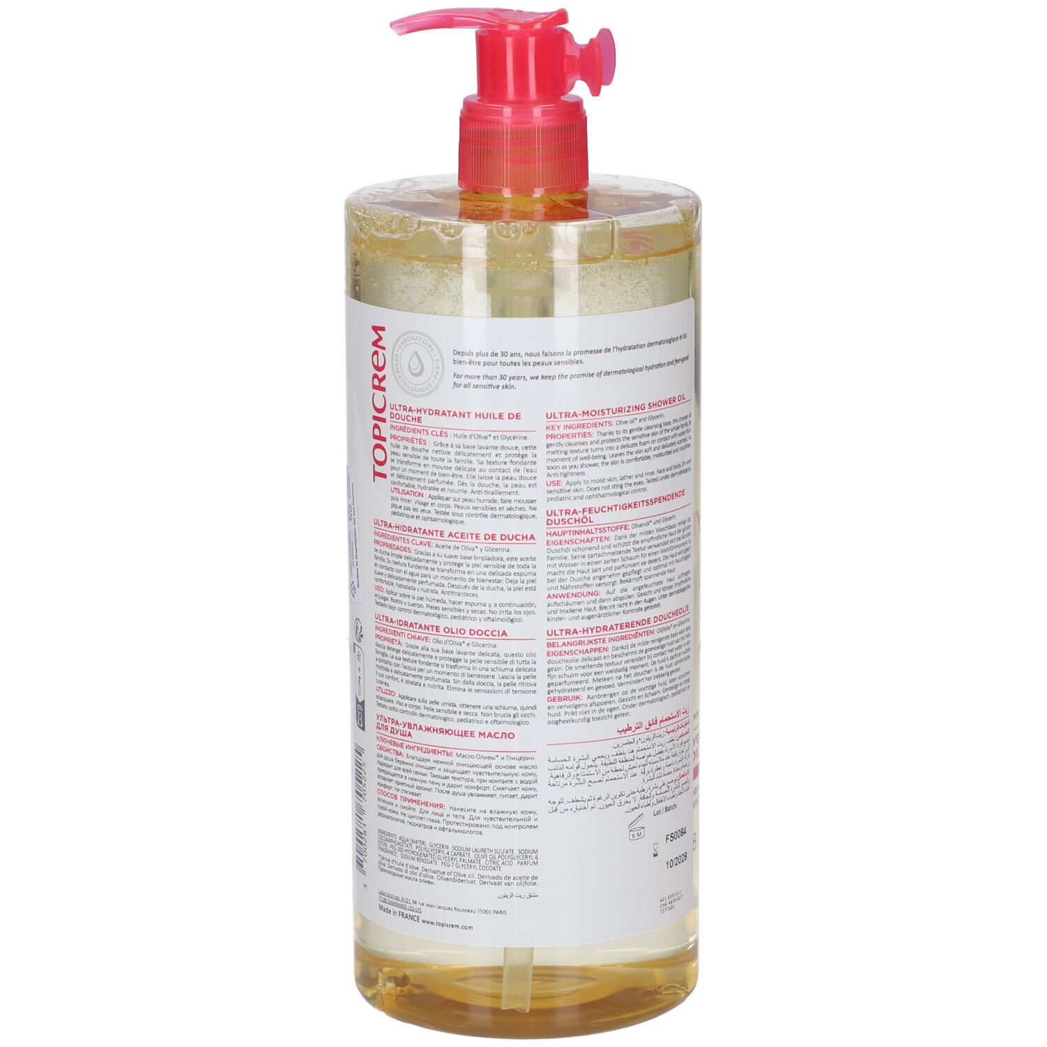Flacone trasparente con pompa rosa. Retro con testo multilingue. Contiene olio d'oliva e glicerina. Marchio TOPICREM.