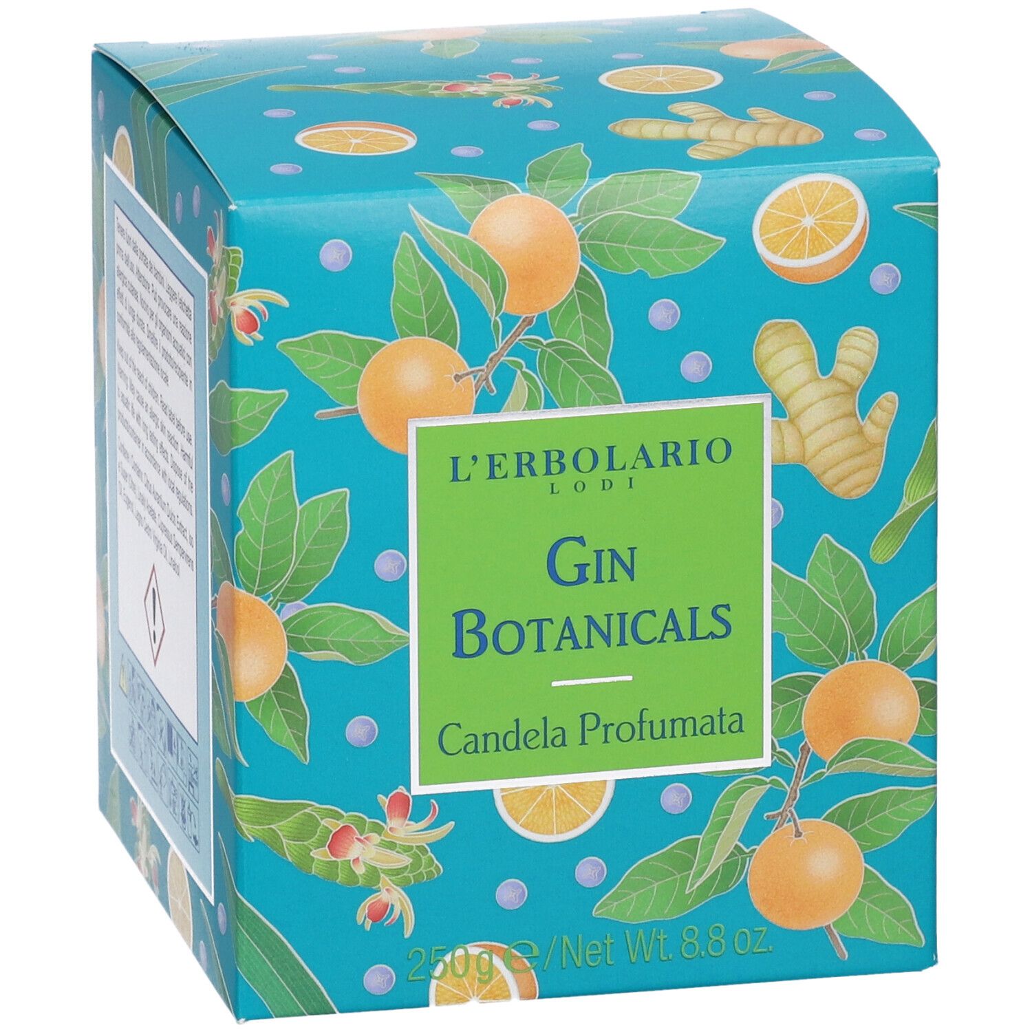 Scatola turchese con motivi di arance e zenzero. Scritto: Gin Botanicals, Candela Profumata. Marchio: L'Erbolario.