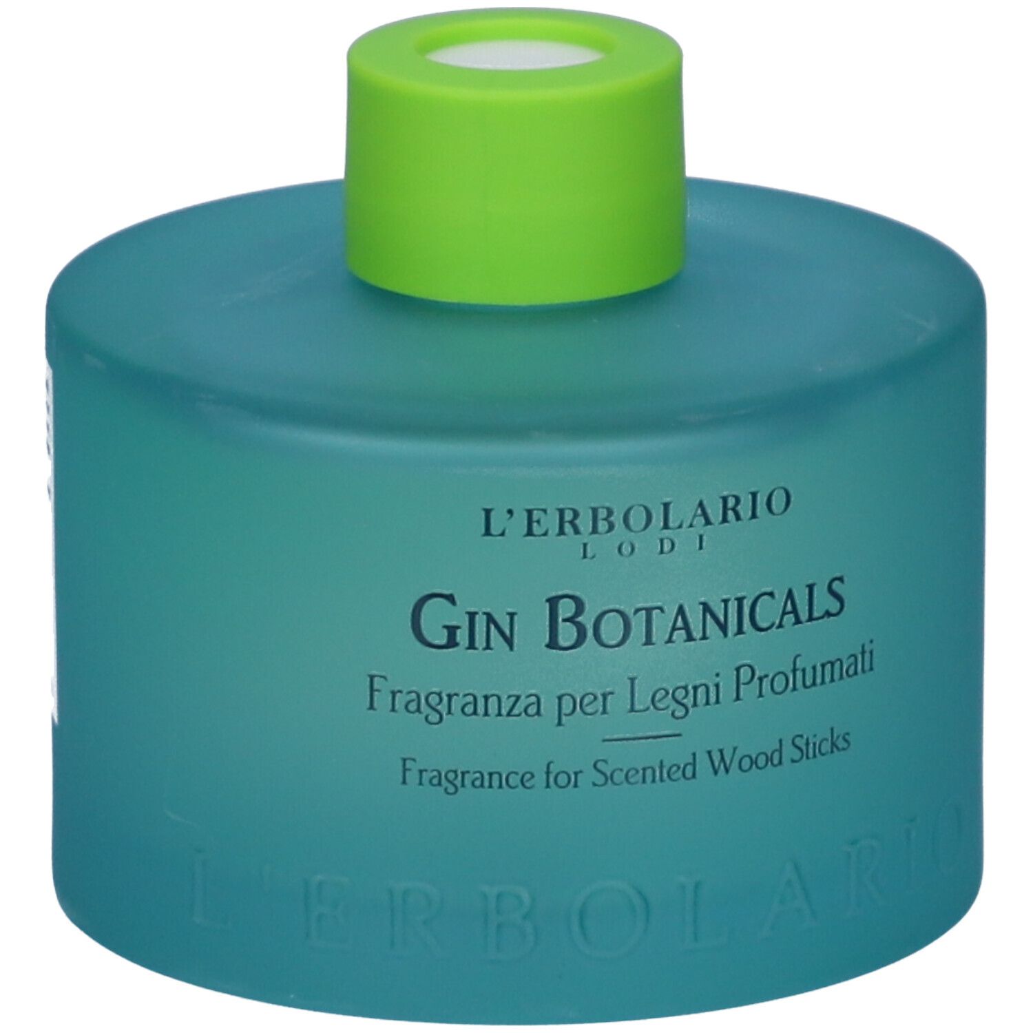 Flacone blu-verde con tappo verde. Testo: L'Erbolario, Gin Botanicals, Fragranza per Legni Profumati, Fragrance for Scented Wood Sticks.