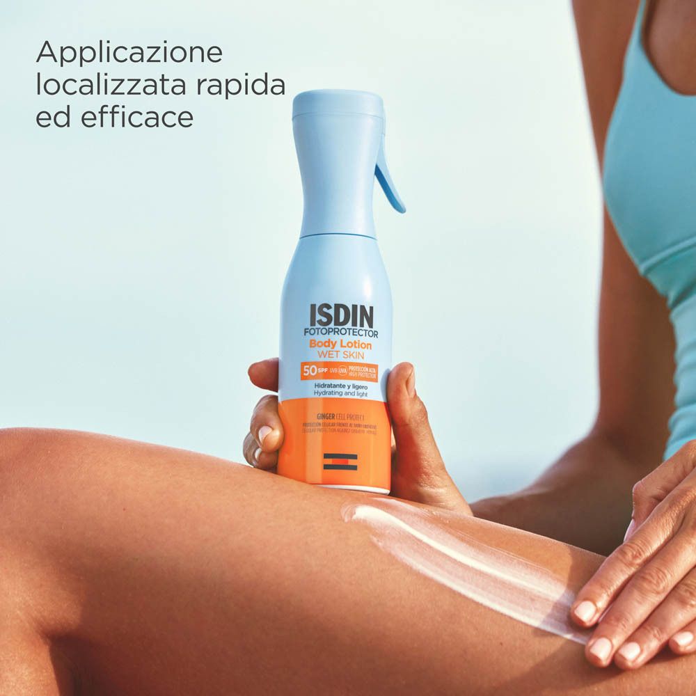 Applicazione del prodotto sulla gamba. ISDIN Fotoprotector Body Lotion Wet Skin. SPF 50.