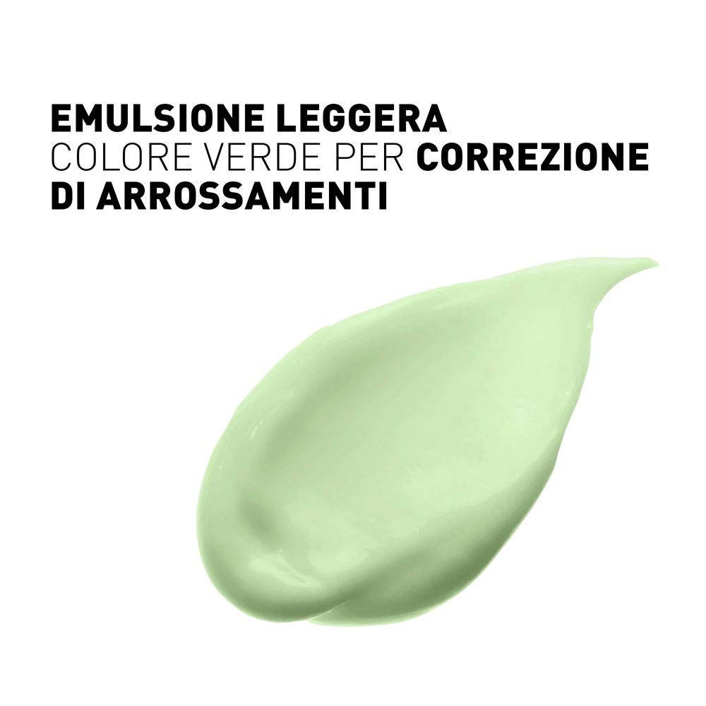 Texture crema verde. Testo: Emulsione per correzione rossori. Su sfondo bianco.