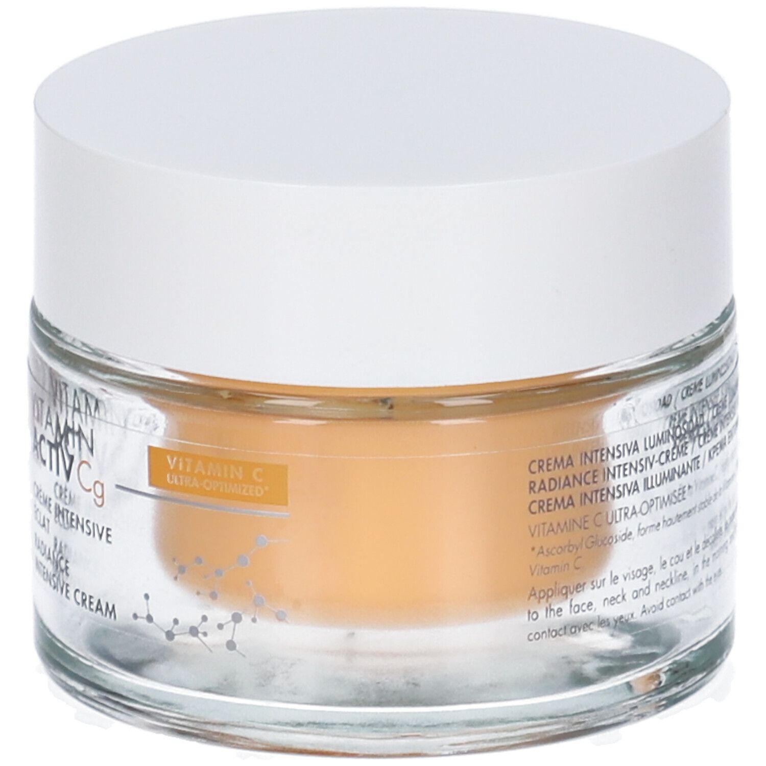 Vasetto di vetro con coperchio bianco. Scritta: Vitamin Activ Cg, Crème intensive éclat, Radiance intensive cream. Vitamin C ultra-optimisée.