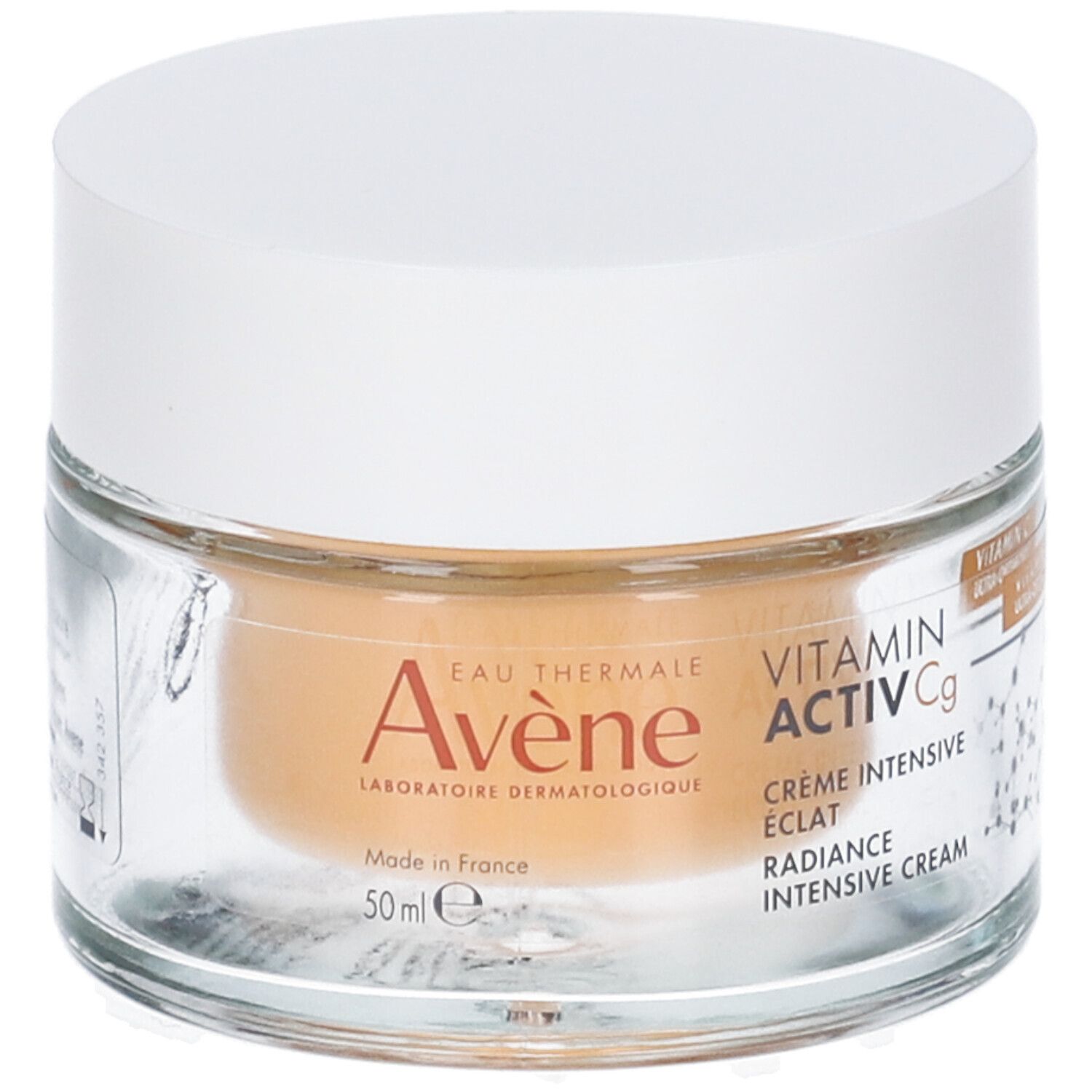 Vasetto di vetro con coperchio bianco. Scritta: Eau Thermale Avène, Vitamin Activ Cg, Crème intensive éclat, Radiance intensive cream.