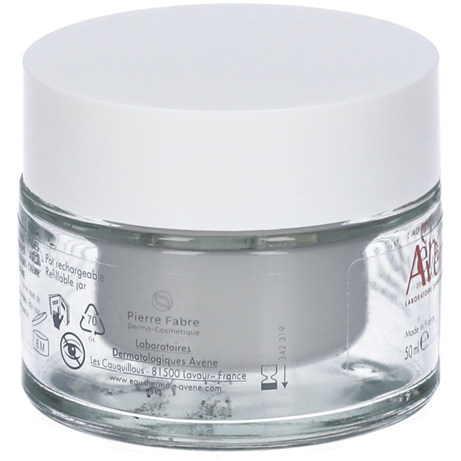 Retro di un vasetto di vetro con coperchio bianco. Scritta: Pierre Fabre, Laboratoires Avène. Informazioni sul riutilizzo.