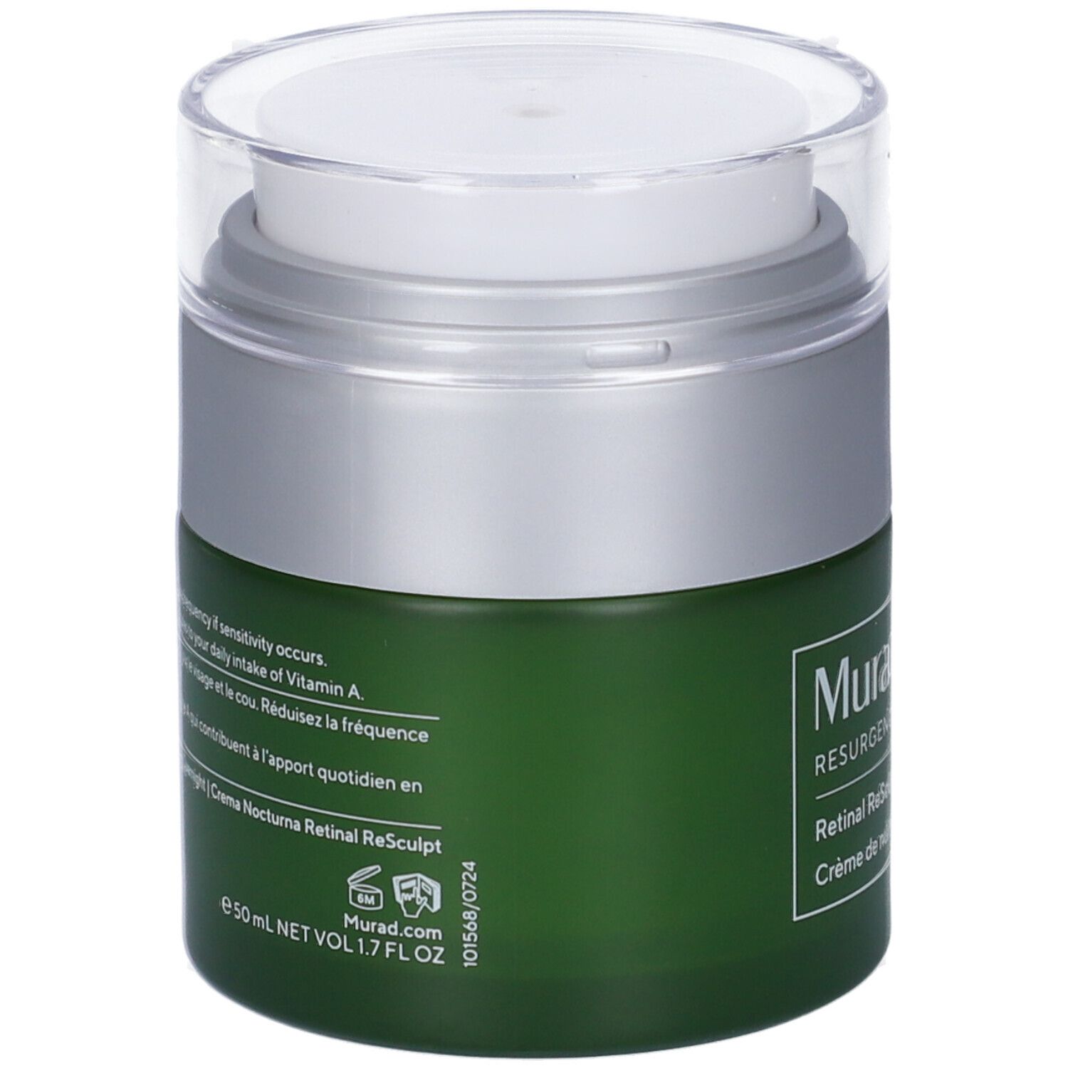 Retro del vaso di crema verde con coperchio argentato. Testo e informazioni.