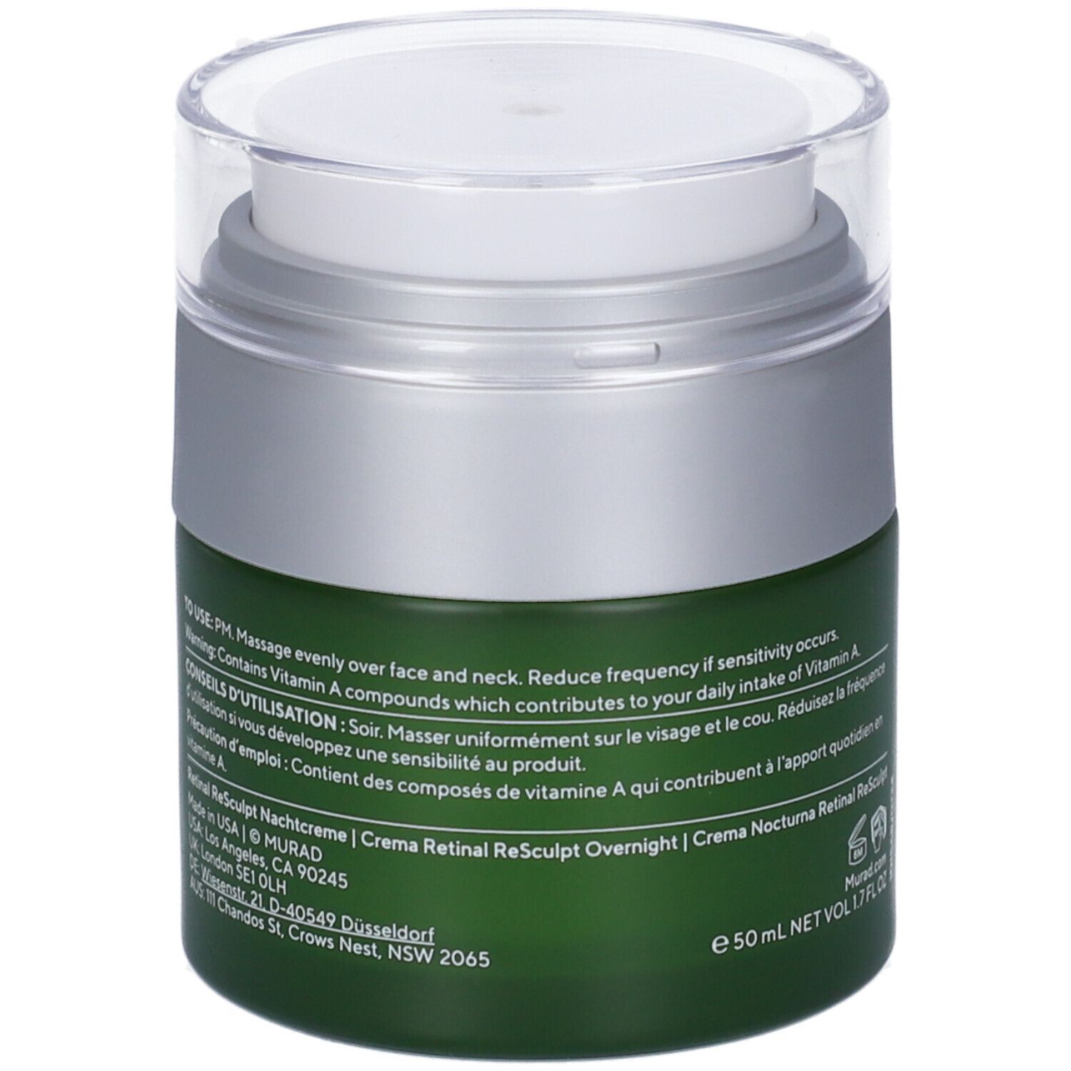 Retro del vaso di crema verde con coperchio argentato. Testo e informazioni.