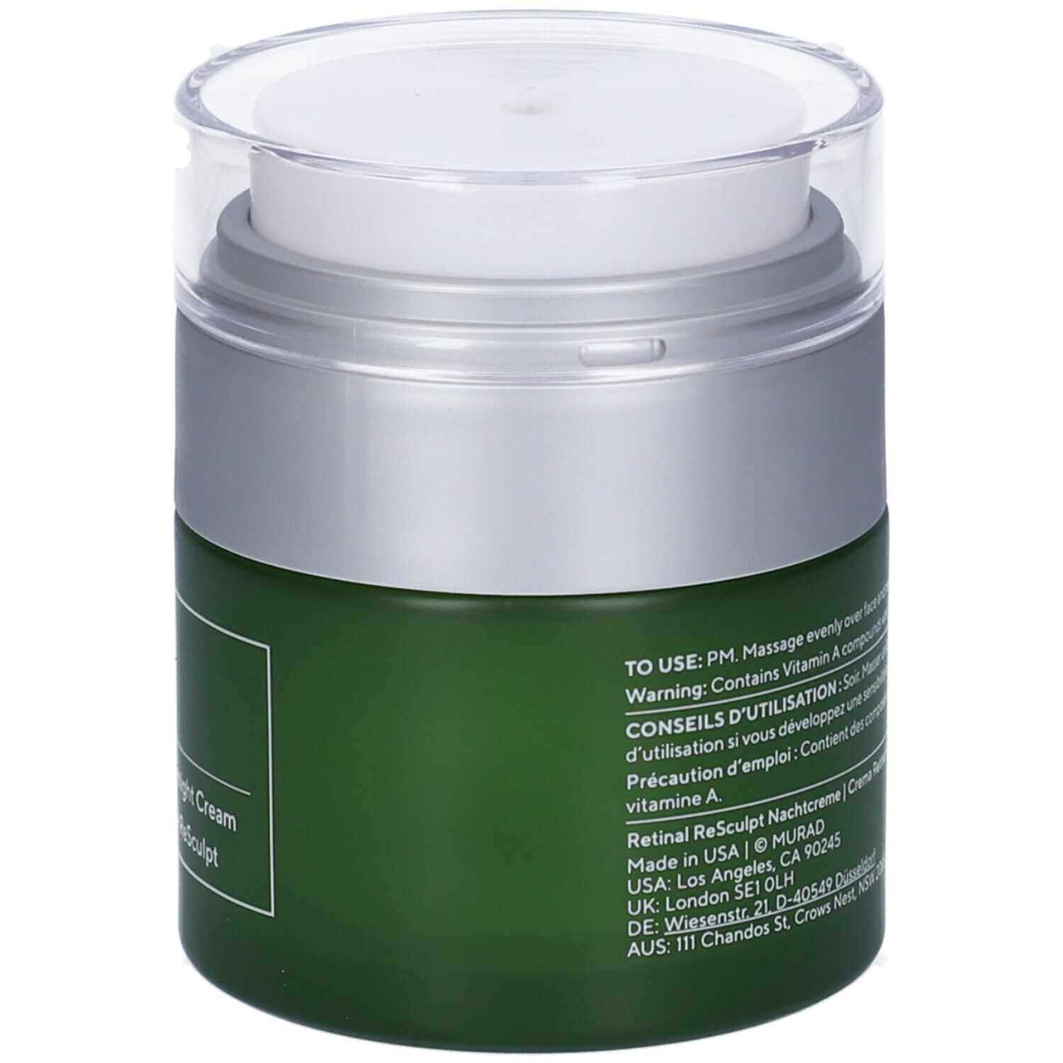 Retro del vaso di crema verde con coperchio argentato. Testo e informazioni.