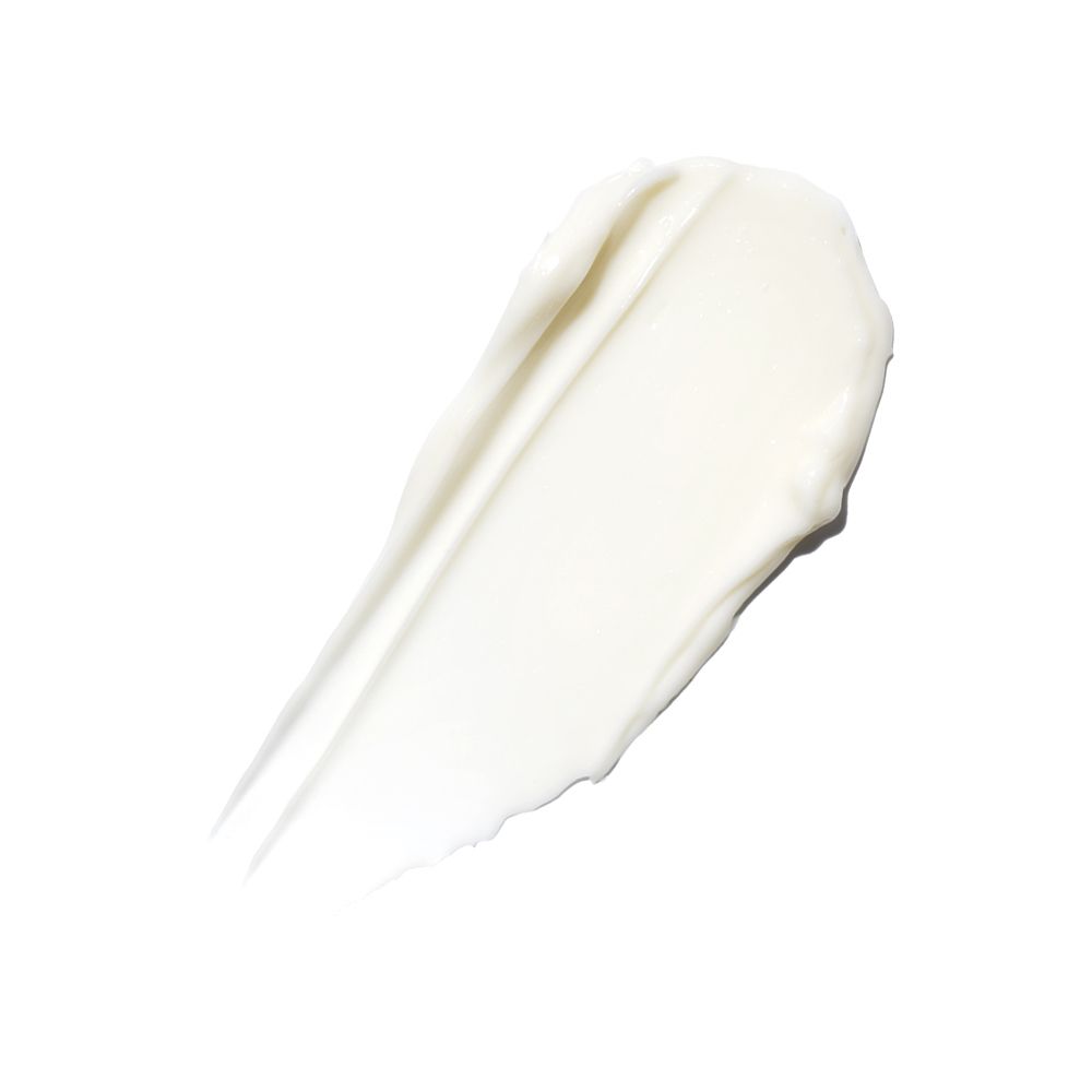 Traccia di crema bianca su sfondo bianco. Consistenza visibile.