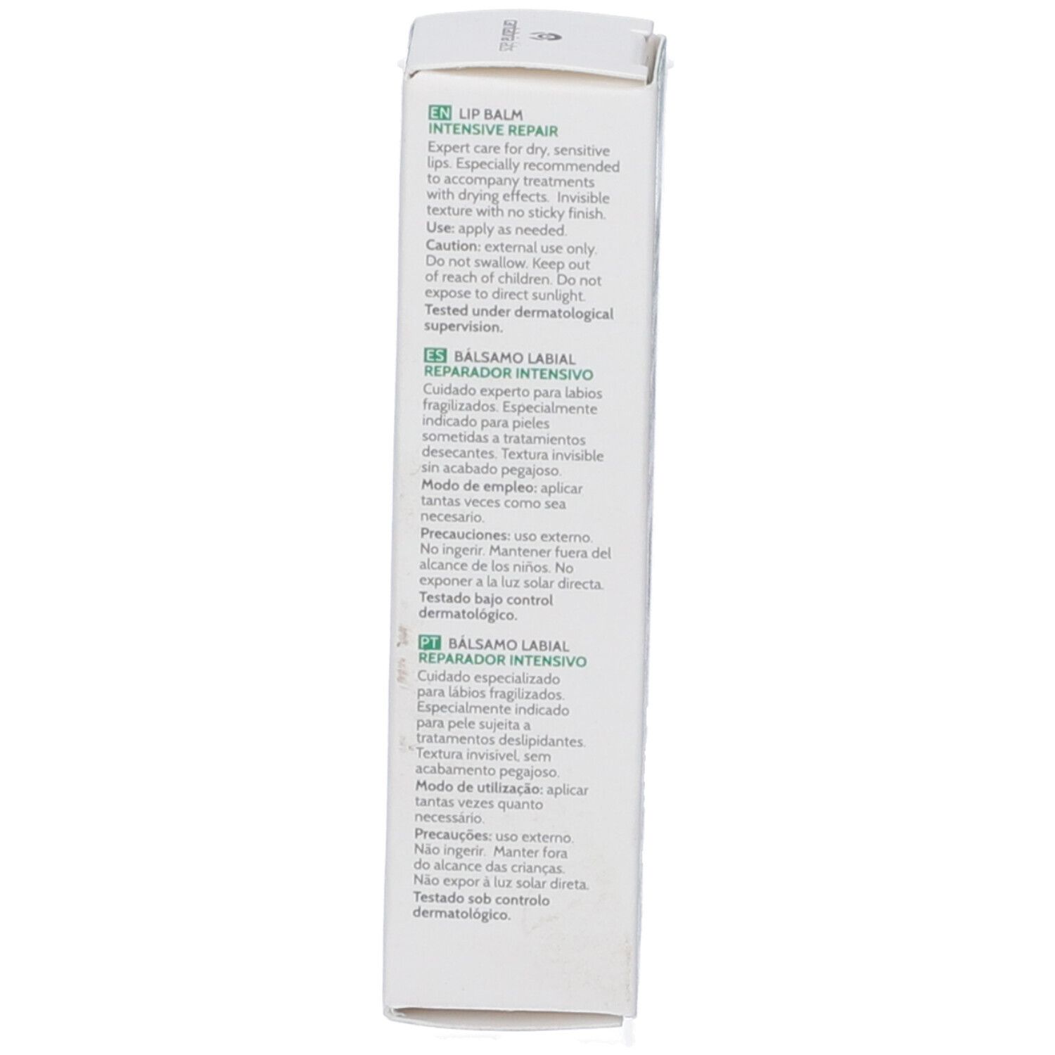 Lato della scatola. Testo multilingue: Lip Balm, Balsamo Labial, Balsamo labbra. Istruzioni per l'uso.