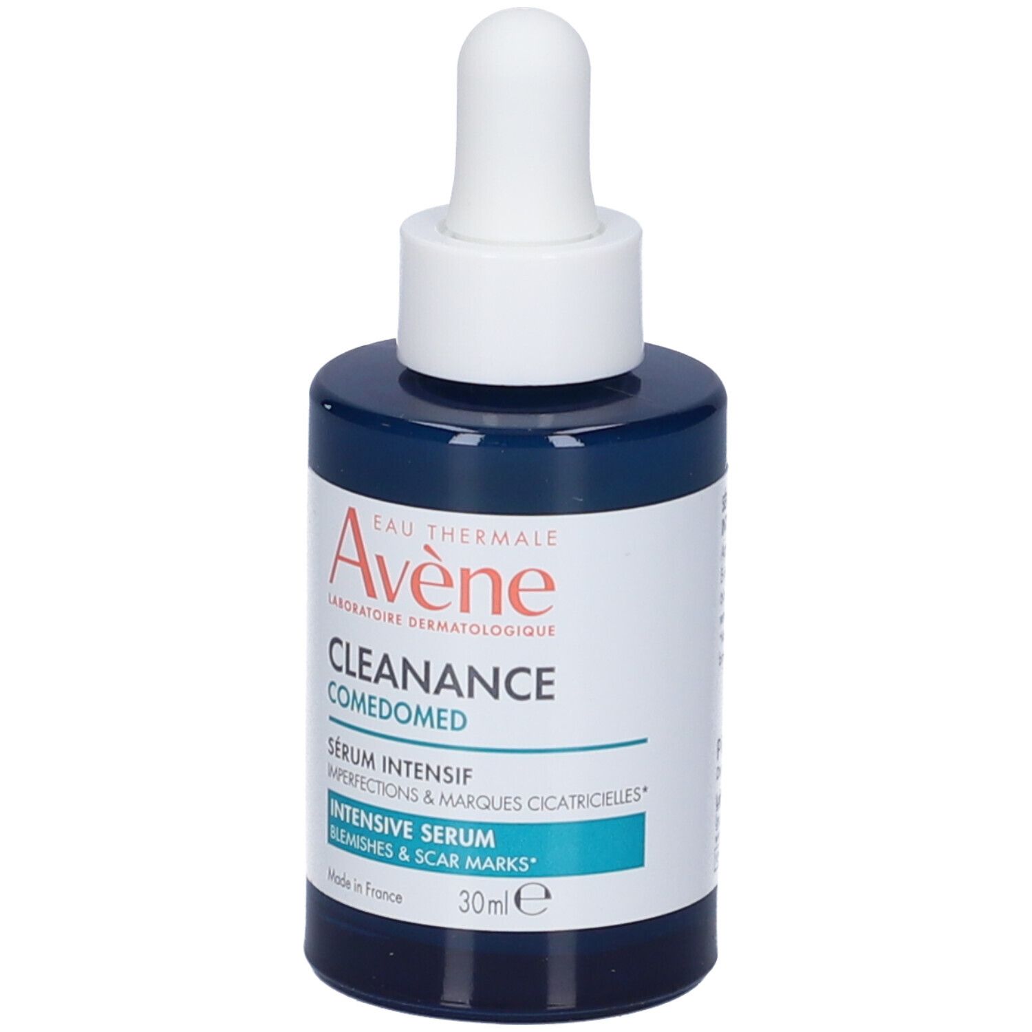 Flacone blu scuro con applicatore bianco. Avene Cleanance Comedomed Siero. Testo: Siero intensivo, 30ml.