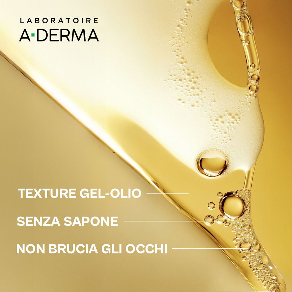 Primo piano di liquido giallo. Testo: Texture Gel-Olio, Senza Sapone, Non Brucia gli Occhi. Logo A-Derma.