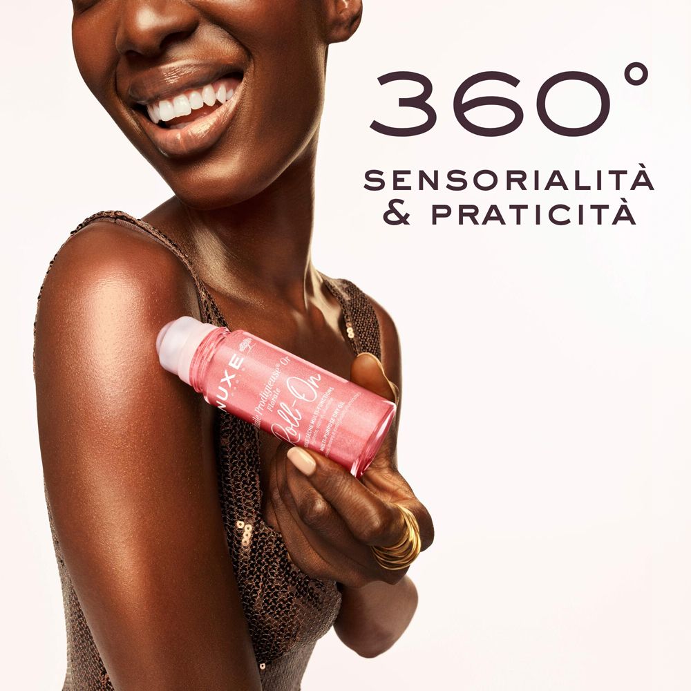 Donna con roll-on sul braccio. Prodotto rosa. Anello dorato. Testo.