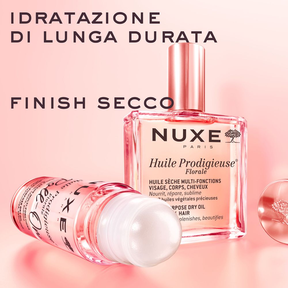 Nuxe Huile Prodigieuse Florale Roll-On e flacone. Sfondo rosa. Testo: Idratatione di lunga durata, Finish Secco.