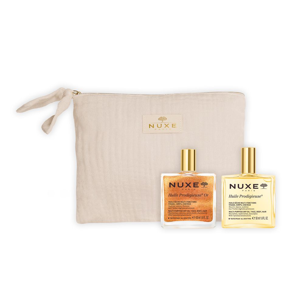 Due flaconi d'olio e una pochette. Scritte "Huile Prodigieuse" e "Huile Prodigieuse Or".