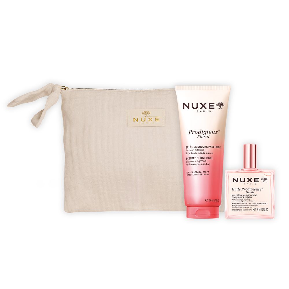 Set regalo con gel doccia, olio e pochette. Prodotti e pochette su sfondo bianco. Testo: Nuxe, Prodigieux Floral.