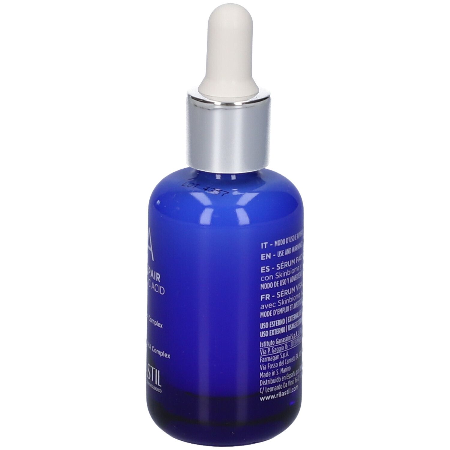 Flacone di vetro blu con contagocce bianco. Testo e scritte. Volume: 30 ml. Marchio: RILASTIL.