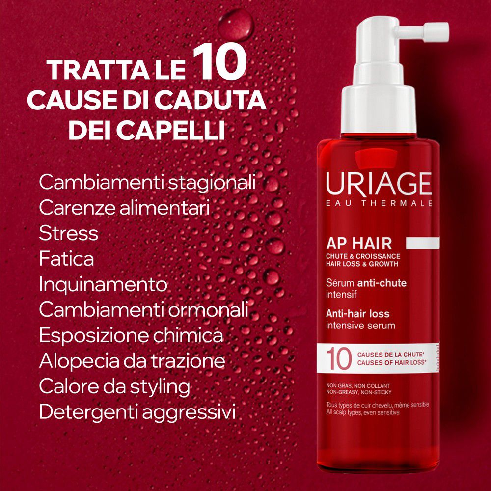 Flacone rosso con applicatore bianco, siero Uriage AP Hair anticaduta.