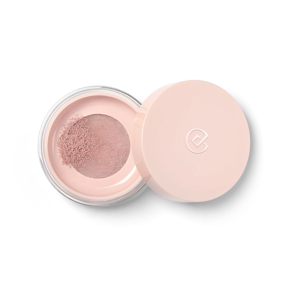 Barattolo aperto con polvere rosa e setaccio. Coperchio accanto. Logo sul coperchio.