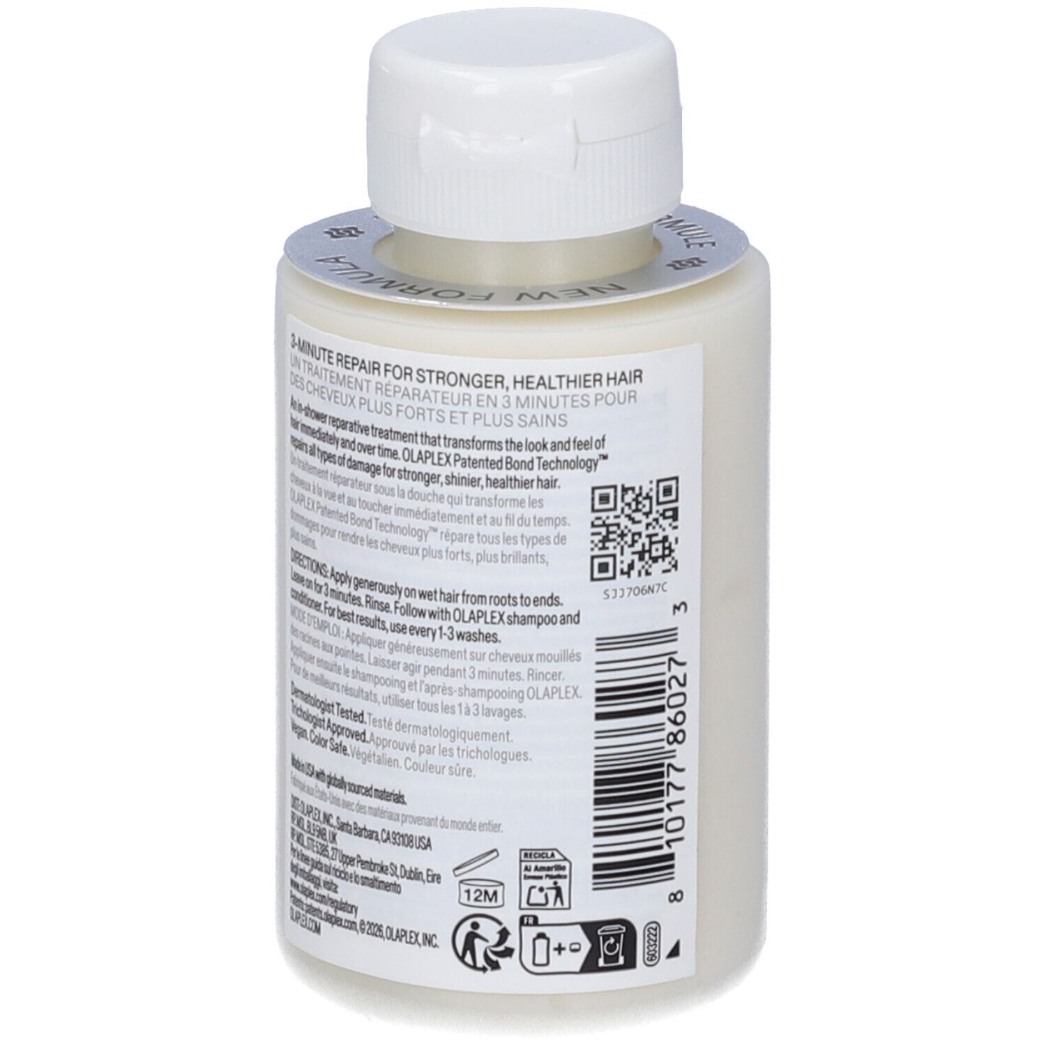 Vista posteriore di un flacone beige con tappo bianco. Testo sull'etichetta: 3-MINUTE REPAIR FOR STRONGER, HEALTHIER HAIR.