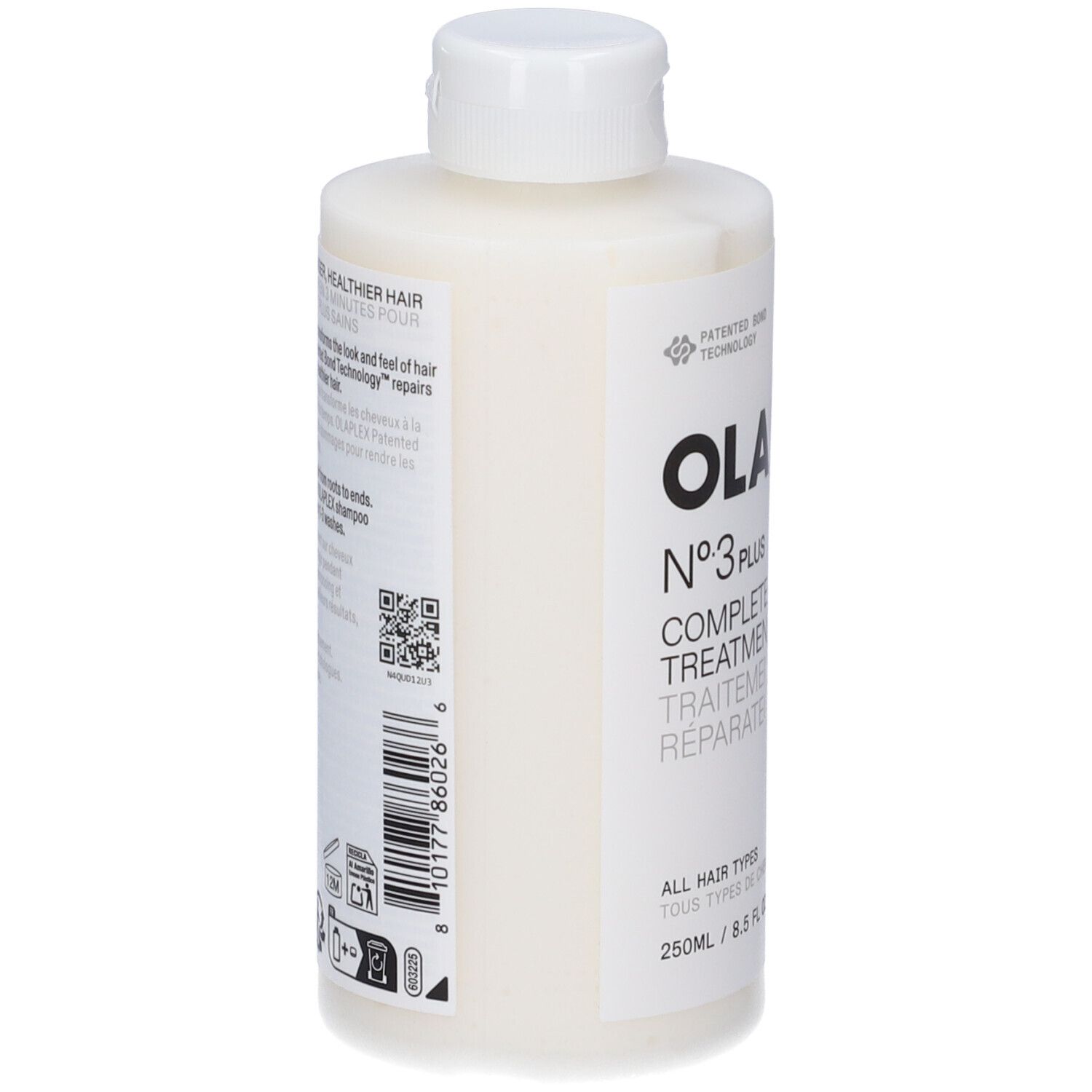 Olaplex N°3 Plus Complete Repair Treatment. Flacone bianco, tappo bianco. Etichetta con testo e codice a barre.