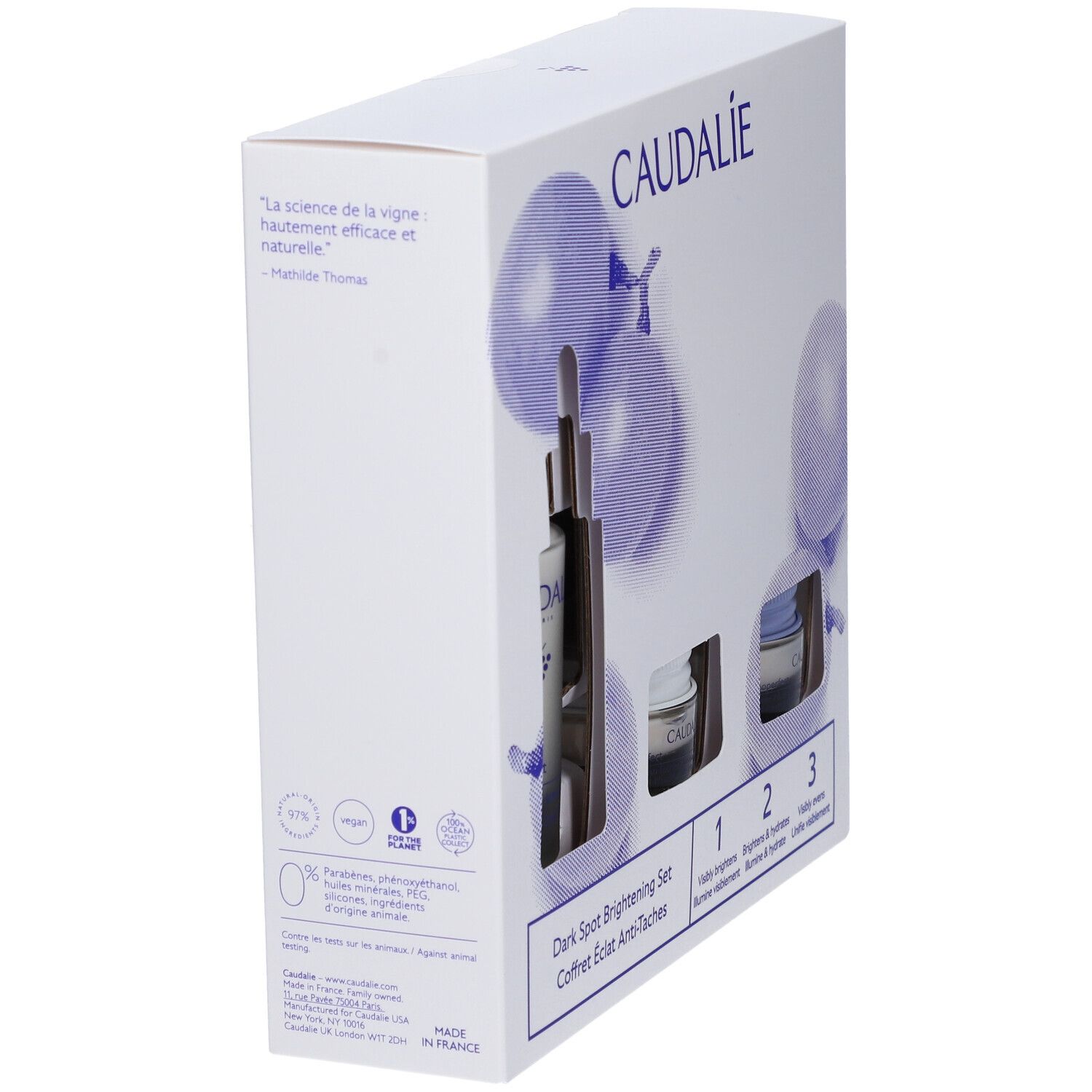 Scatola bianca Caudalie con prodotti cosmetici. Set schiarente anti-macchie. Stampe con informazioni e logo.