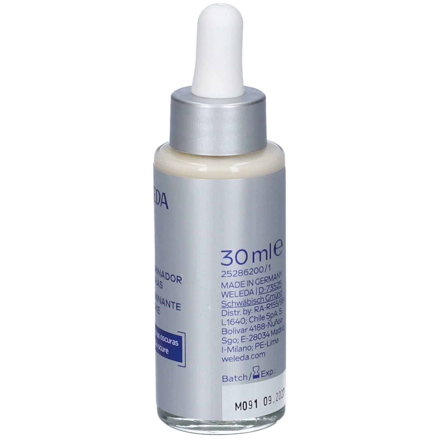 Flacone di siero Weleda. Scritta: 30 ml, Made in Germany. Testo: numero di lotto e data di scadenza. Sérum Illuminador Antimanchas.