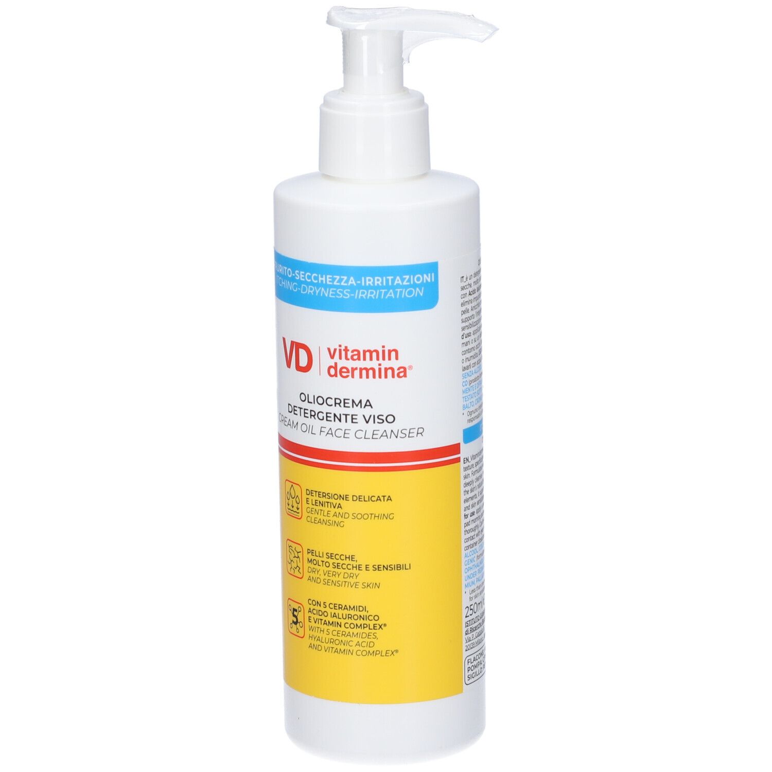 Flacone bianco con dosatore. Scritta: Vitamin Dermina Oliocrema Detergente Viso. Etichette gialle con testo.