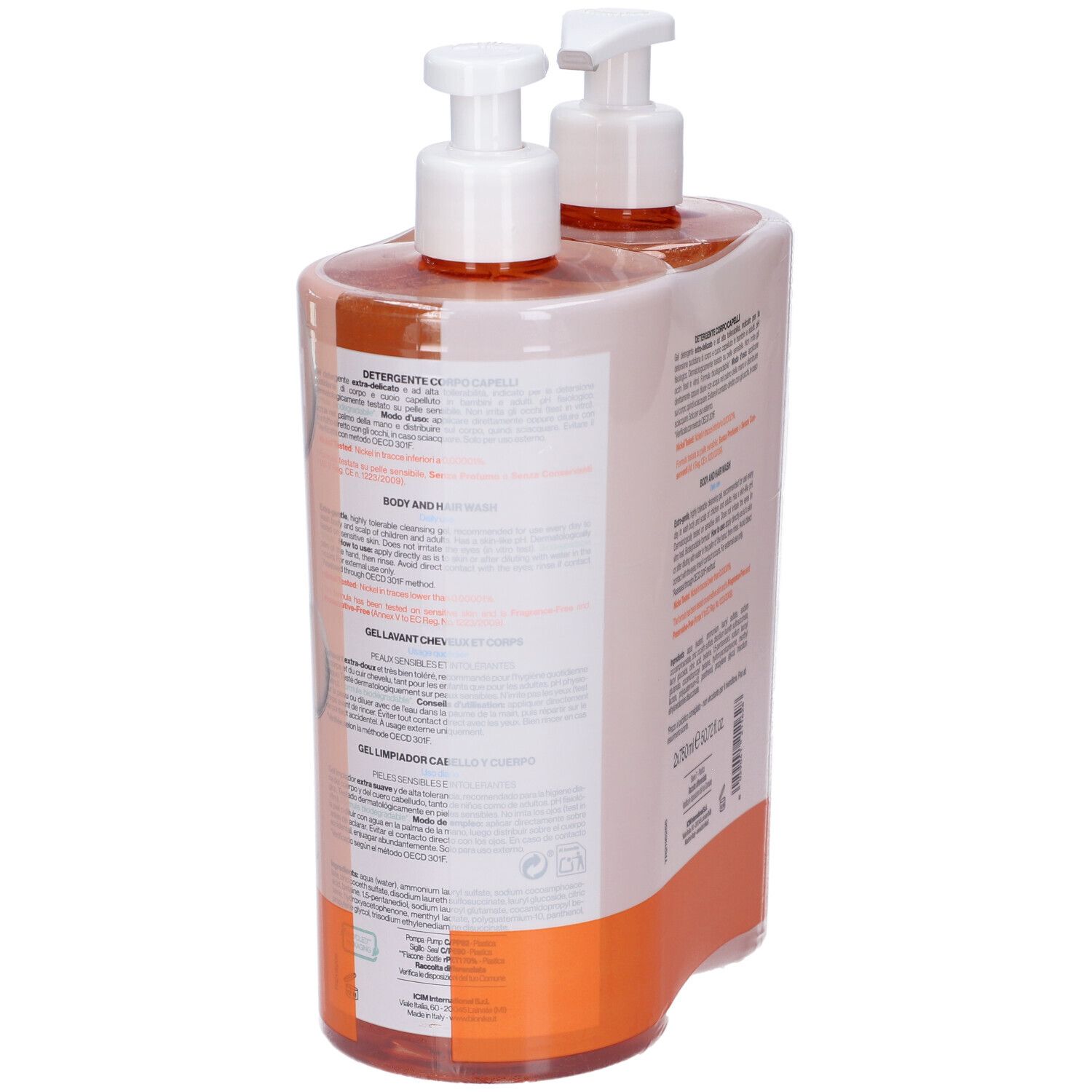 Due flaconi con pompa contenenti liquido arancione, etichette con testo.
