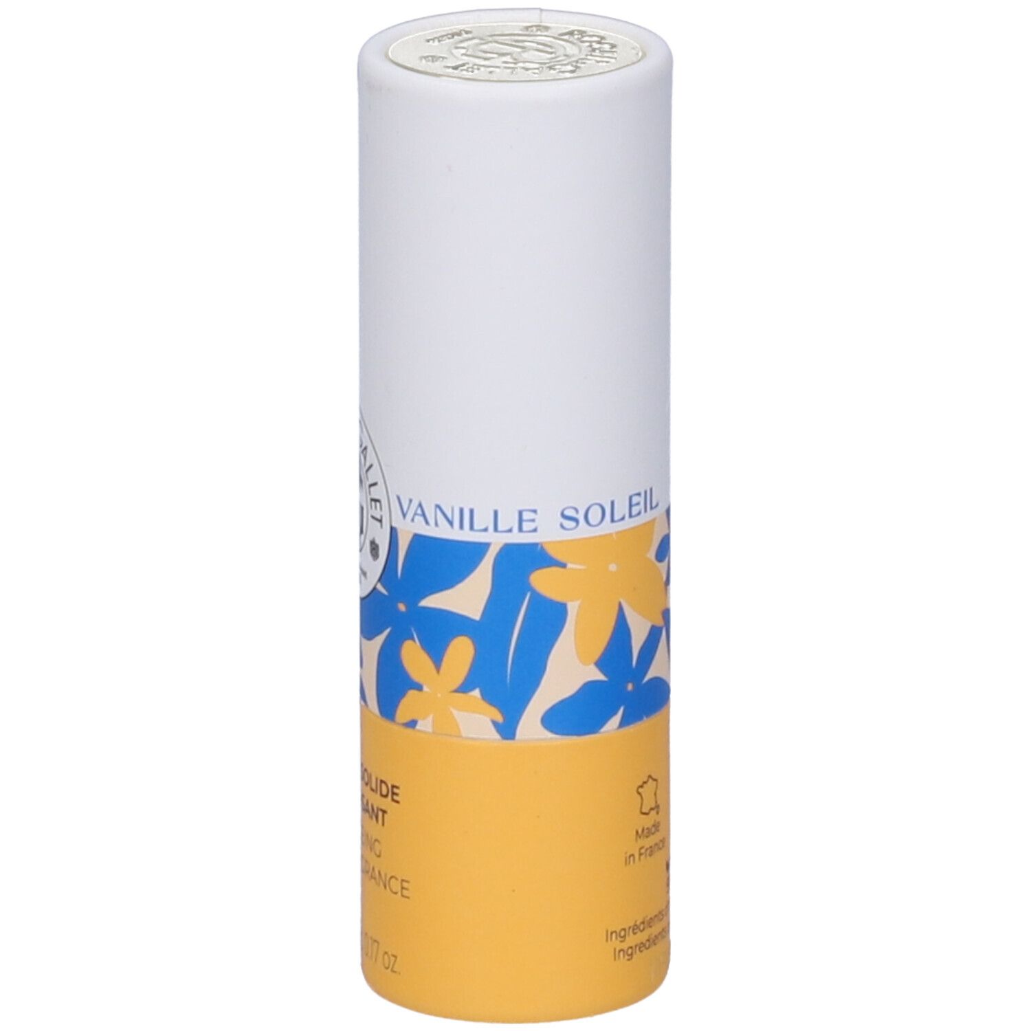 Confezione cilindrica. Coperchio bianco, corpo bianco con motivo floreale e base gialla. Testo: Vanille Soleil, Parfum Solide, 5g.