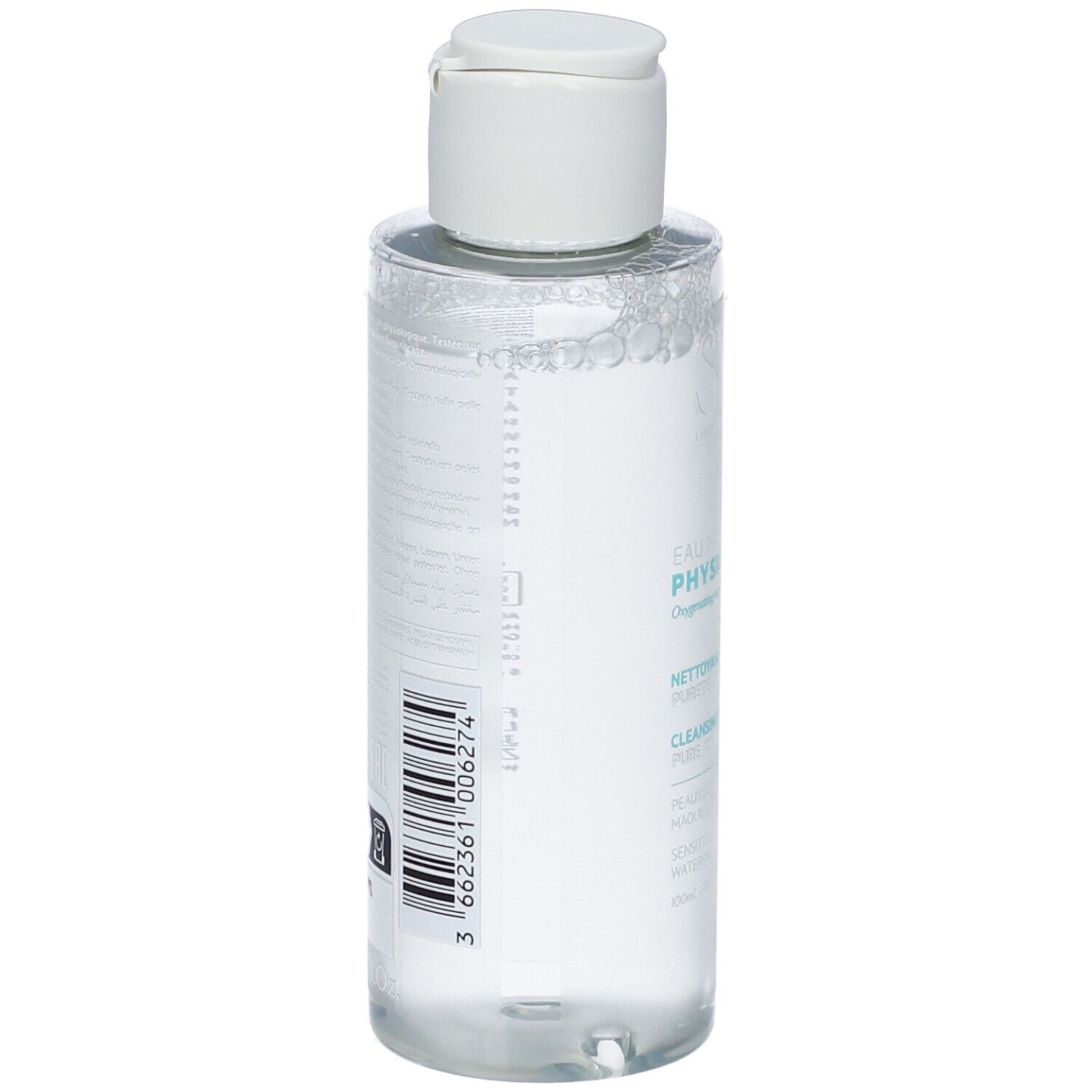 Liquido limpido in flacone trasparente con tappo a scatto bianco. Etichetta con testo 'EAU PHYSIOLOGIQUE' e codice a barre.