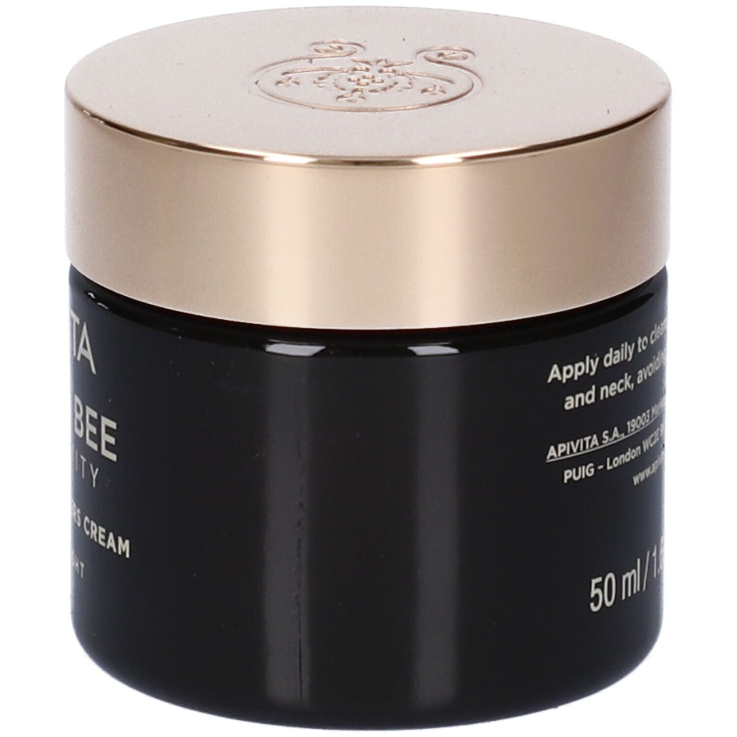 Vasetto di crema nero con coperchio dorato. Scritta: Apivita Queen Bee Longevity. Testo: istruzioni per l'uso.