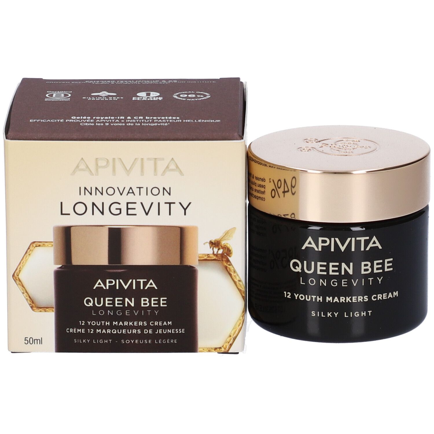 Vasetto di crema e confezione. Scritta: Apivita Queen Bee Longevity 12 Youth Markers Cream. 50ml. Scatola con ape.