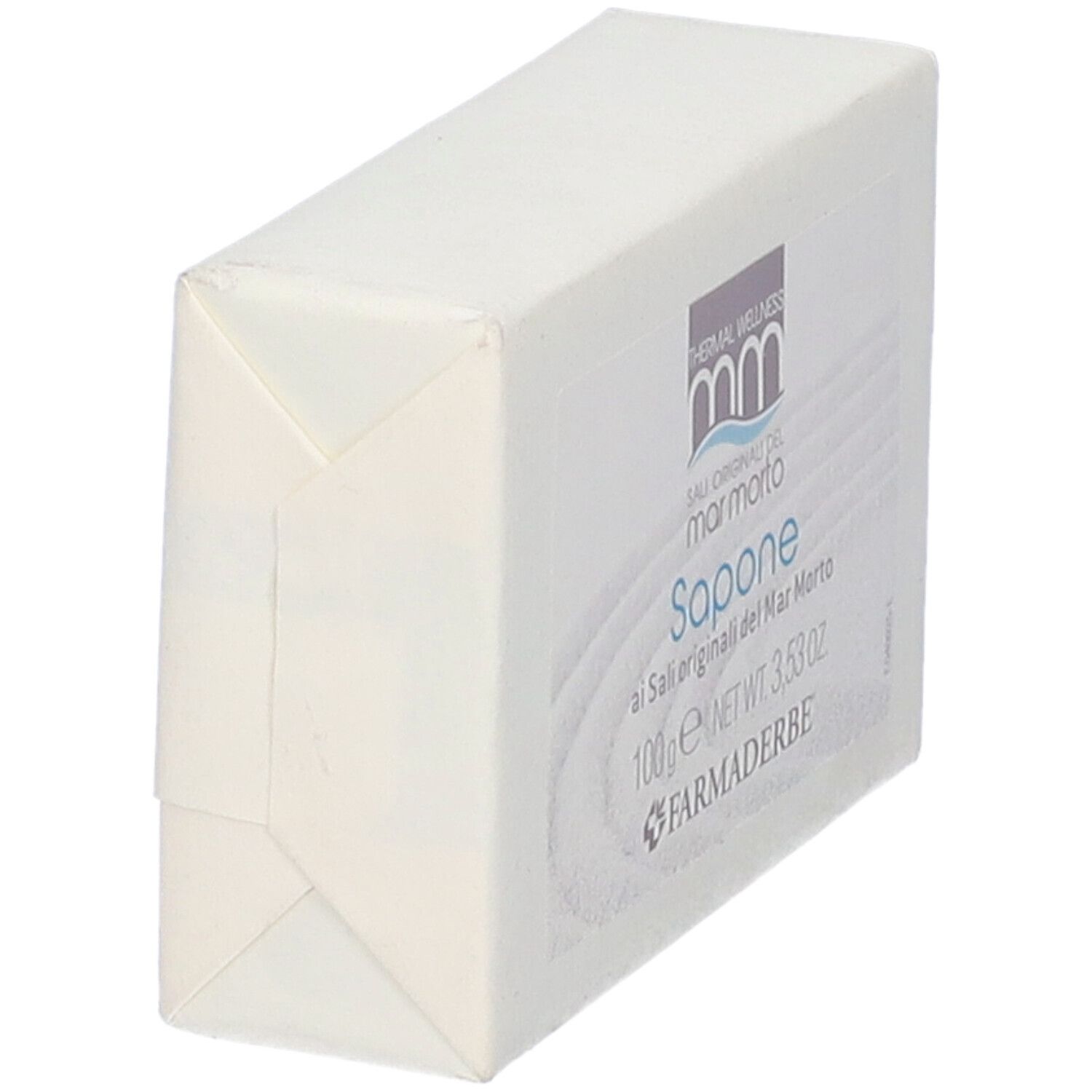 Sapone avvolto in carta bianca. Forma rettangolare.
