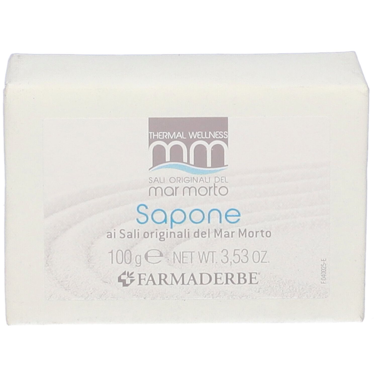Sapone avvolto in carta bianca. Etichetta con informazioni e logo. Scritta "Sali originali del mar morto".