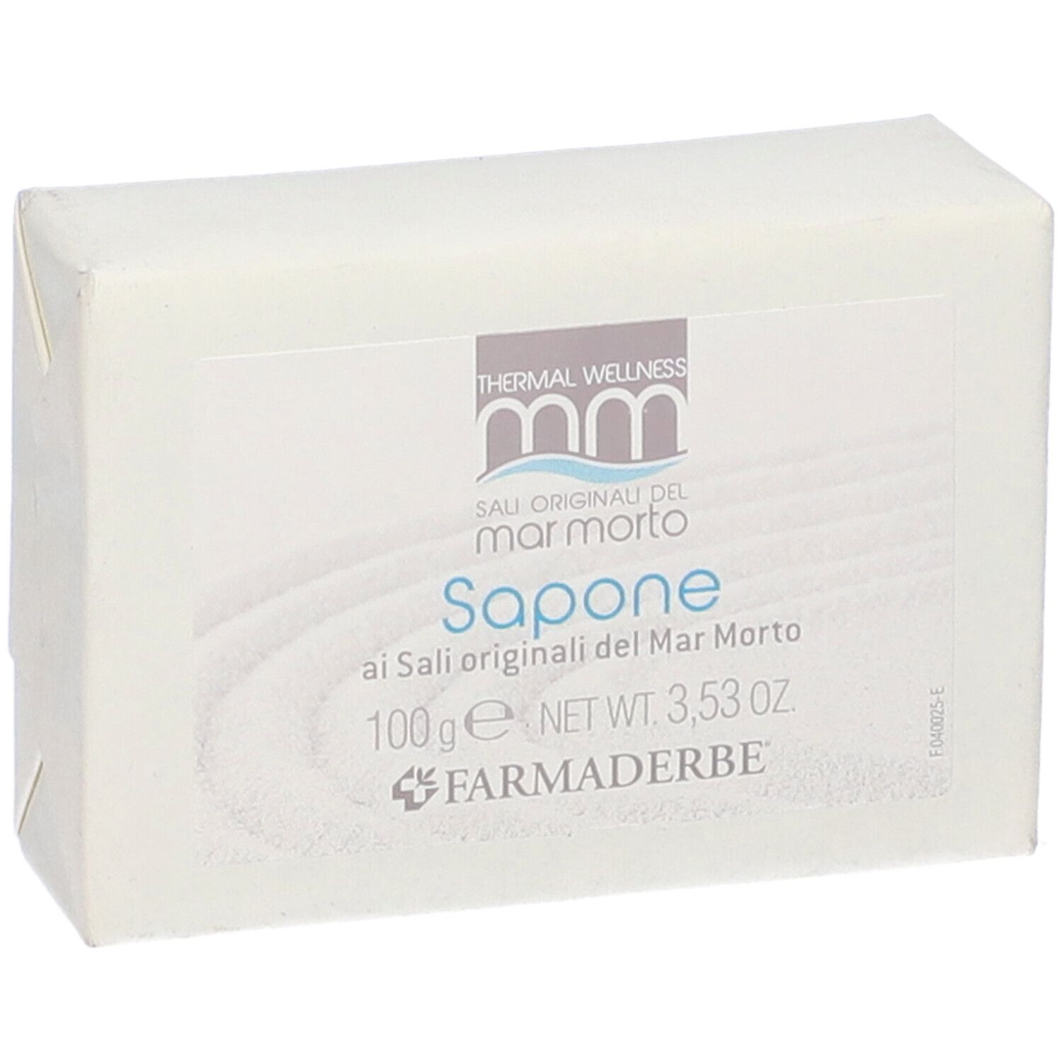 Sapone avvolto in carta bianca. Etichetta con informazioni e logo. Scritta "Sali originali del mar morto".