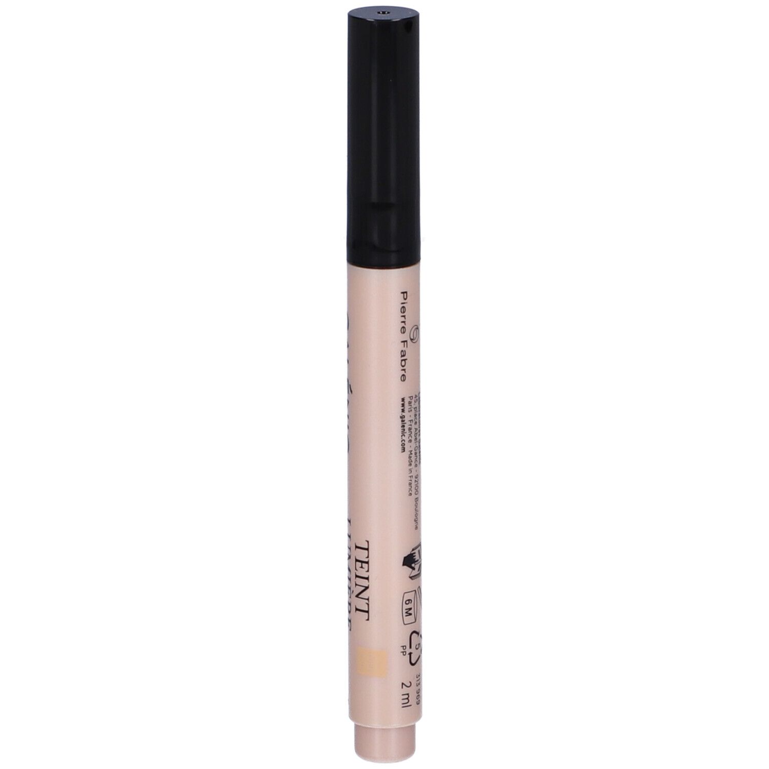 Penna con tappo nero. Scritta: Pierre Fabre, Teint Lumière. Penna beige. Retro con testo e simboli.