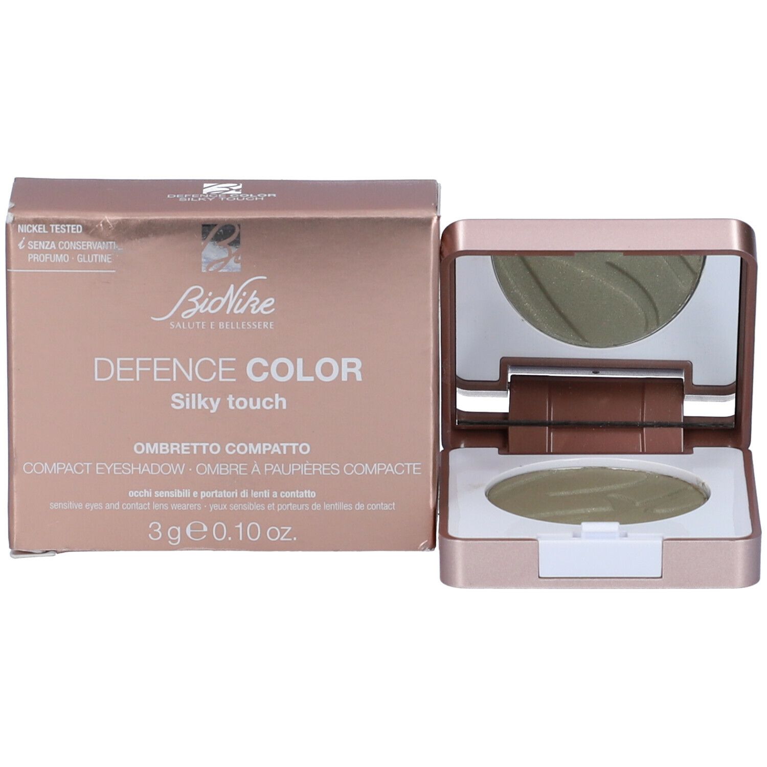 Confezione ombretto con contenitore oro rosa e ombretto verde. Testo: Defence Color.