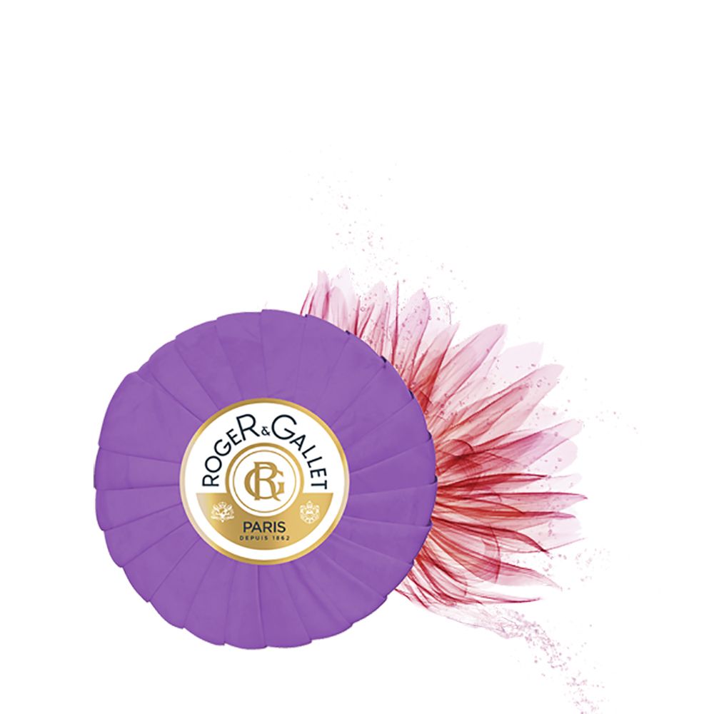 Sapone rotondo viola con logo ROGER&GALLET PARIS. Sfondo floreale rosso.