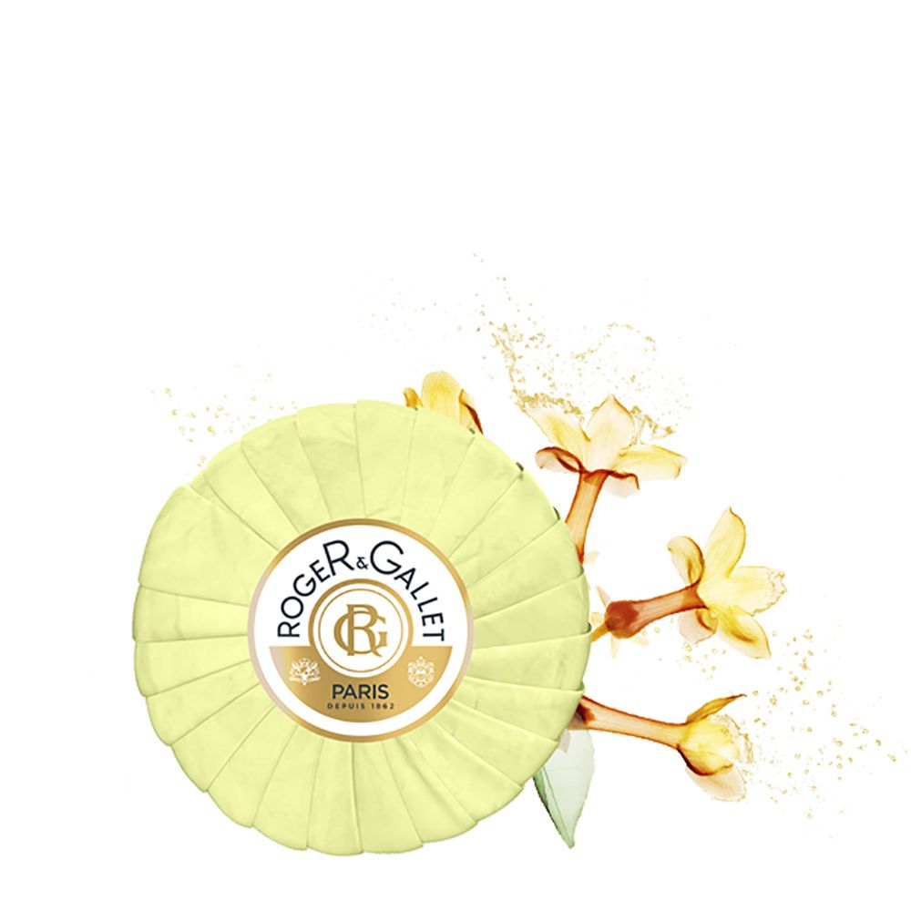 Sapone rotondo giallo chiaro, con logo e testo. Con rami fioriti. Marca: Roger&Gallet.