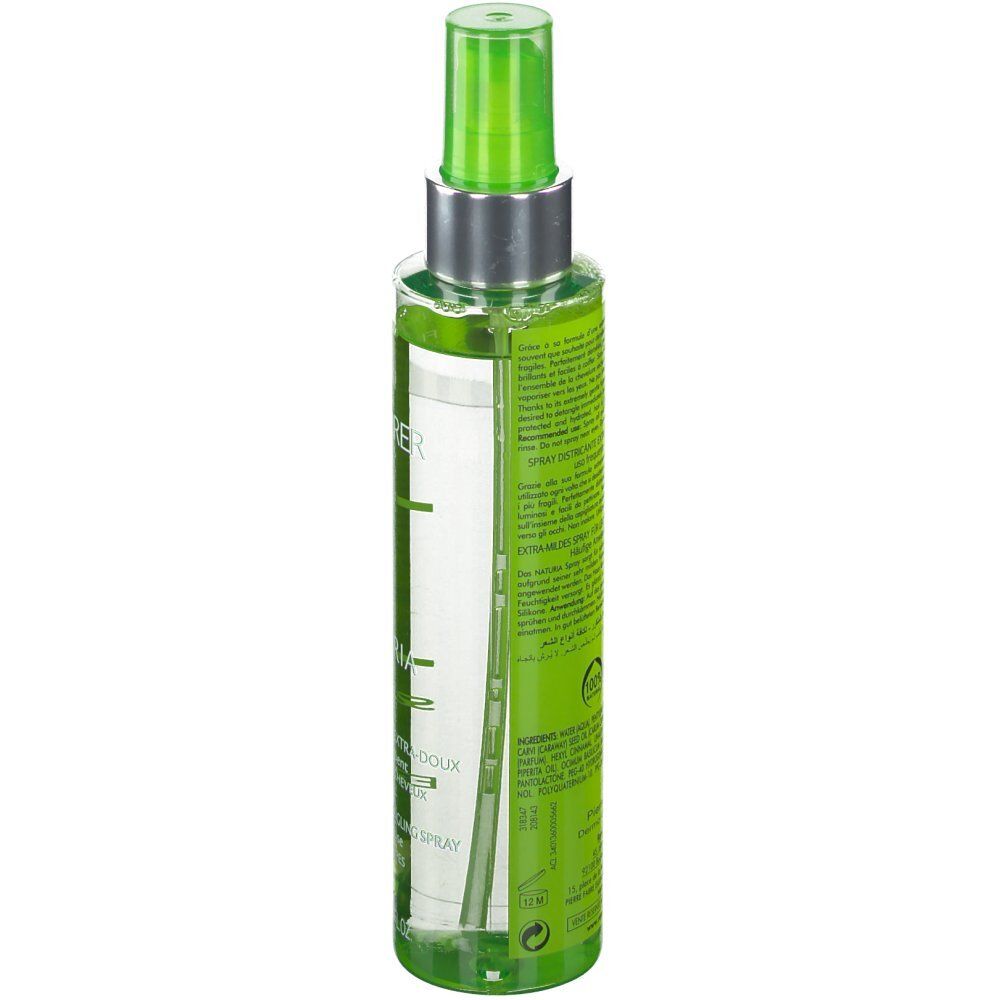 Vista posteriore del flacone spray verde. Scritte e testo in diverse lingue. Liquido trasparente visibile.