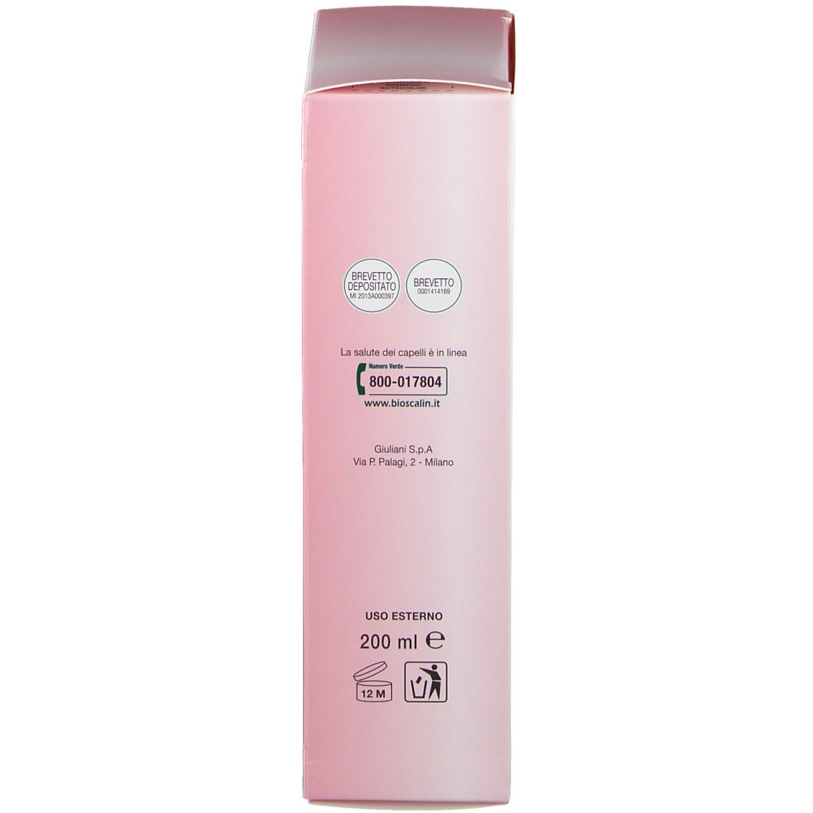 Retro di un flacone rosa. Testo in italiano. Contiene informazioni sul prodotto.