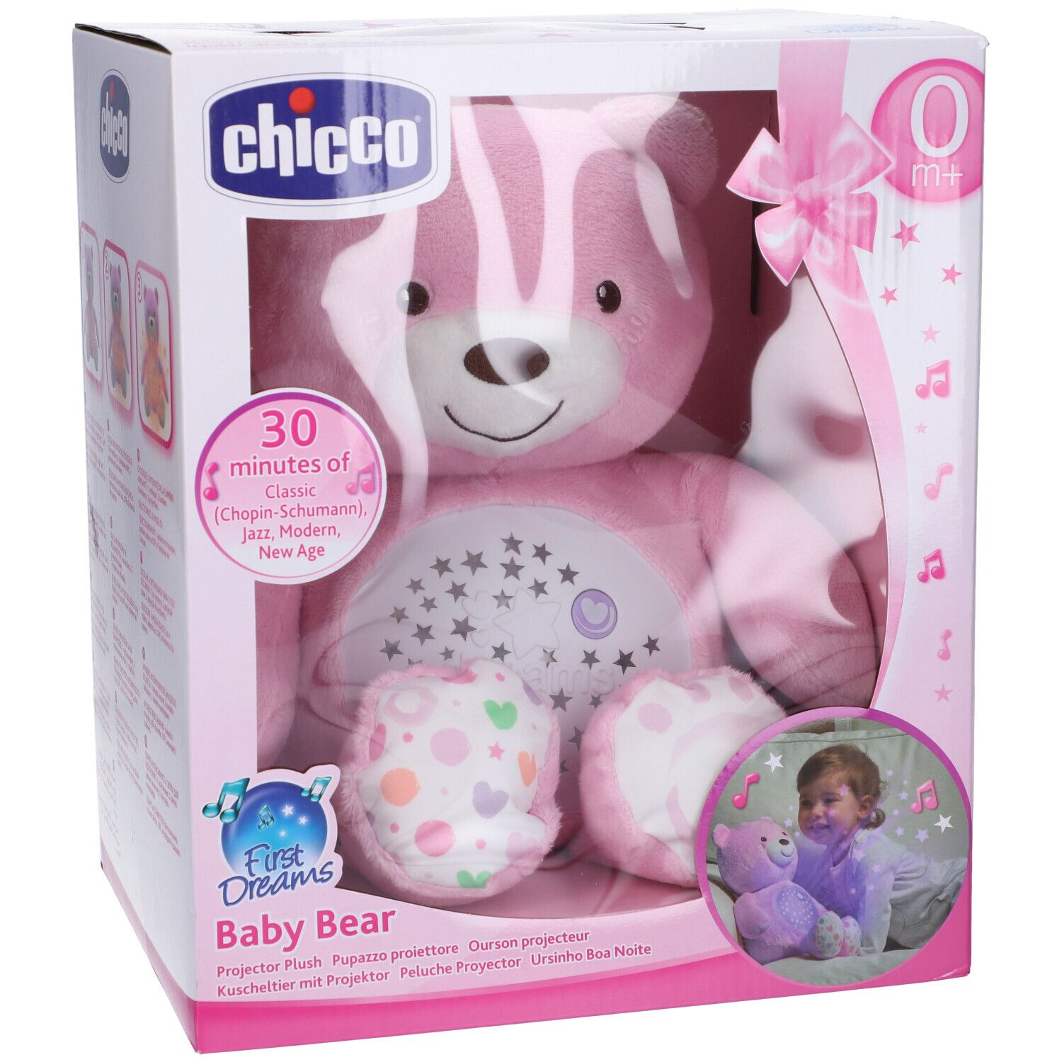 Chicco Baby Orsetto Rosa in confezione. Orsetto rosa con proiettore stelle, fiocco e etichetta 0+. Finestra visibile.