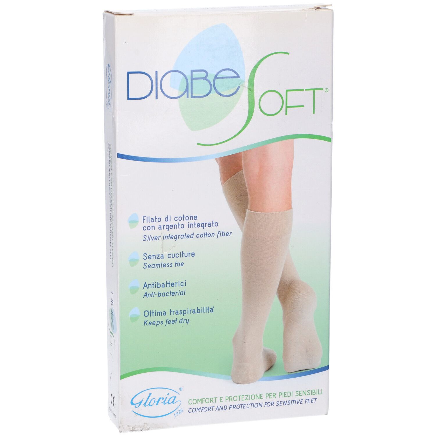 Confezione di calze Diabesoft. Calze beige raffigurate sulla confezione. Testo: Filato di cotone con argento integrato.