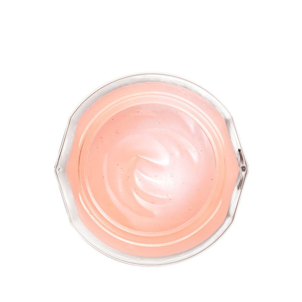 Maschera Vichy dall'alto. Maschera rosa in contenitore trasparente. Forma rotonda con scanalature concentriche.
