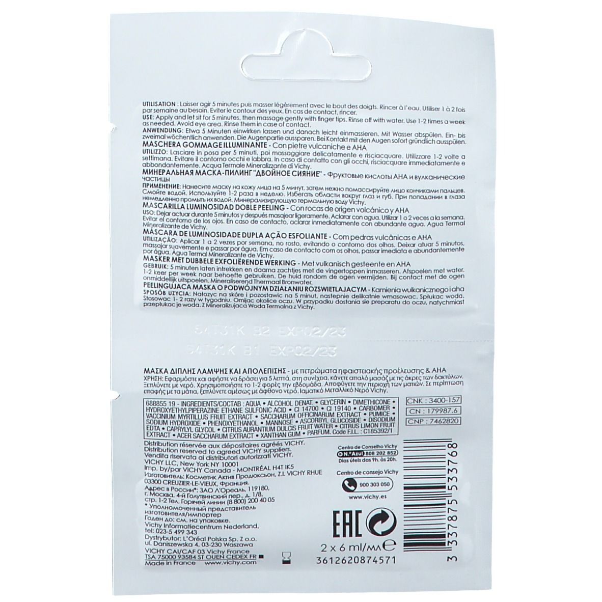 Retro della confezione Vichy Peelingmaske. Informazioni testuali multilingue. Nome del prodotto non visibile. Confezione con apertura.