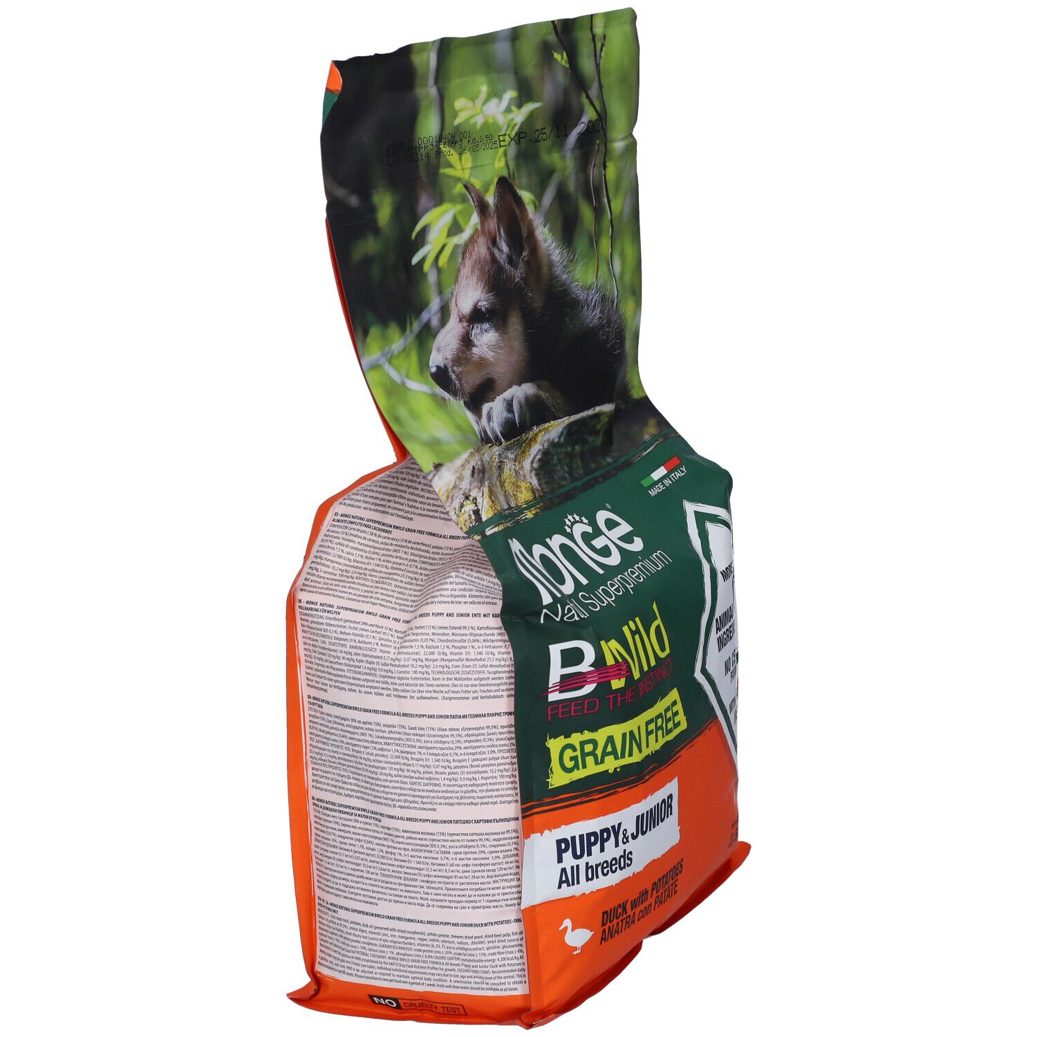 Sacchetto di cibo per cani, vista laterale. Scritta: Monge Bwild Grain Free Puppy & Junior. Contiene il 65% di ingredienti animali, senza cereali.